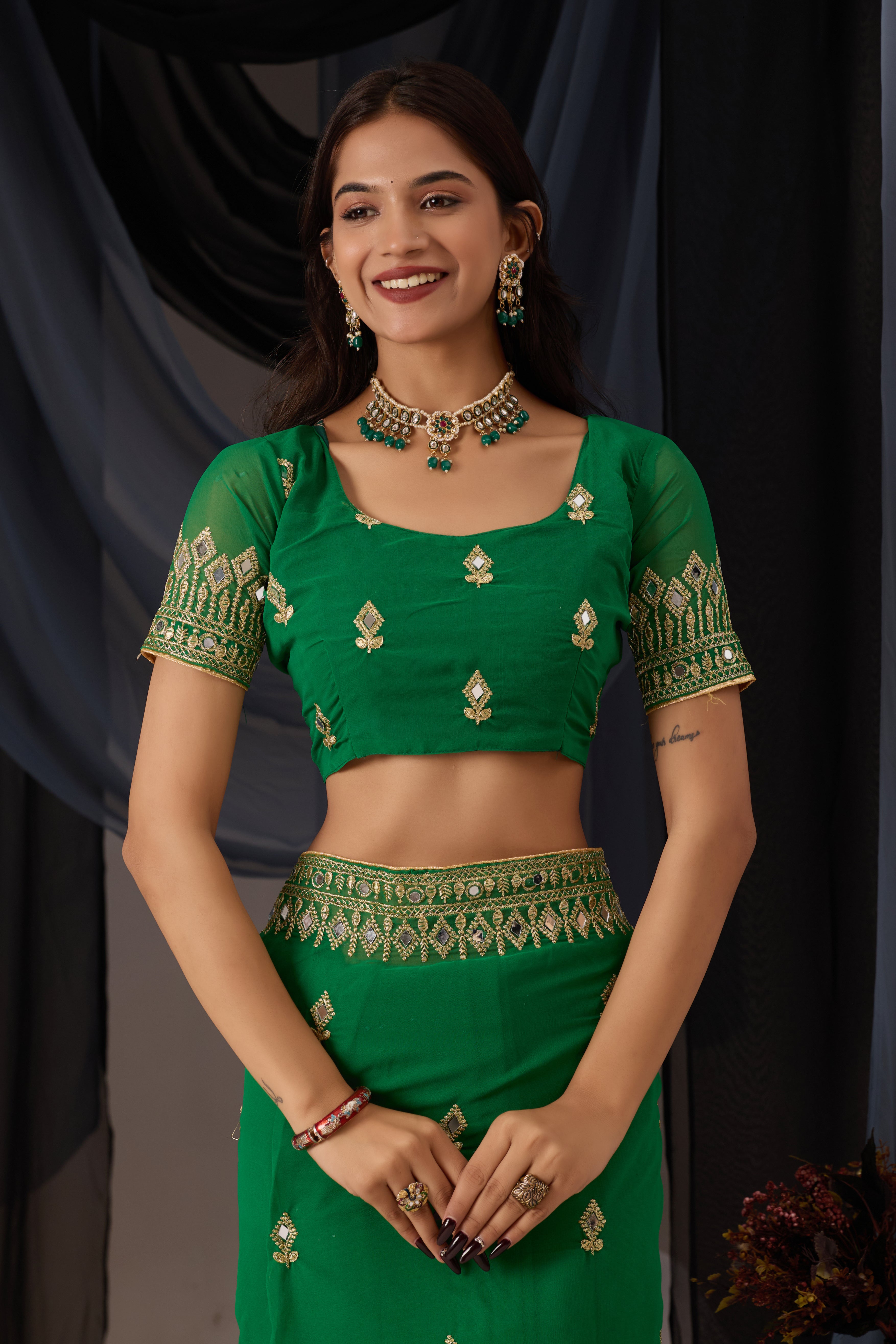 Elegant Green Georgette Saree with Golden Embroidered Border