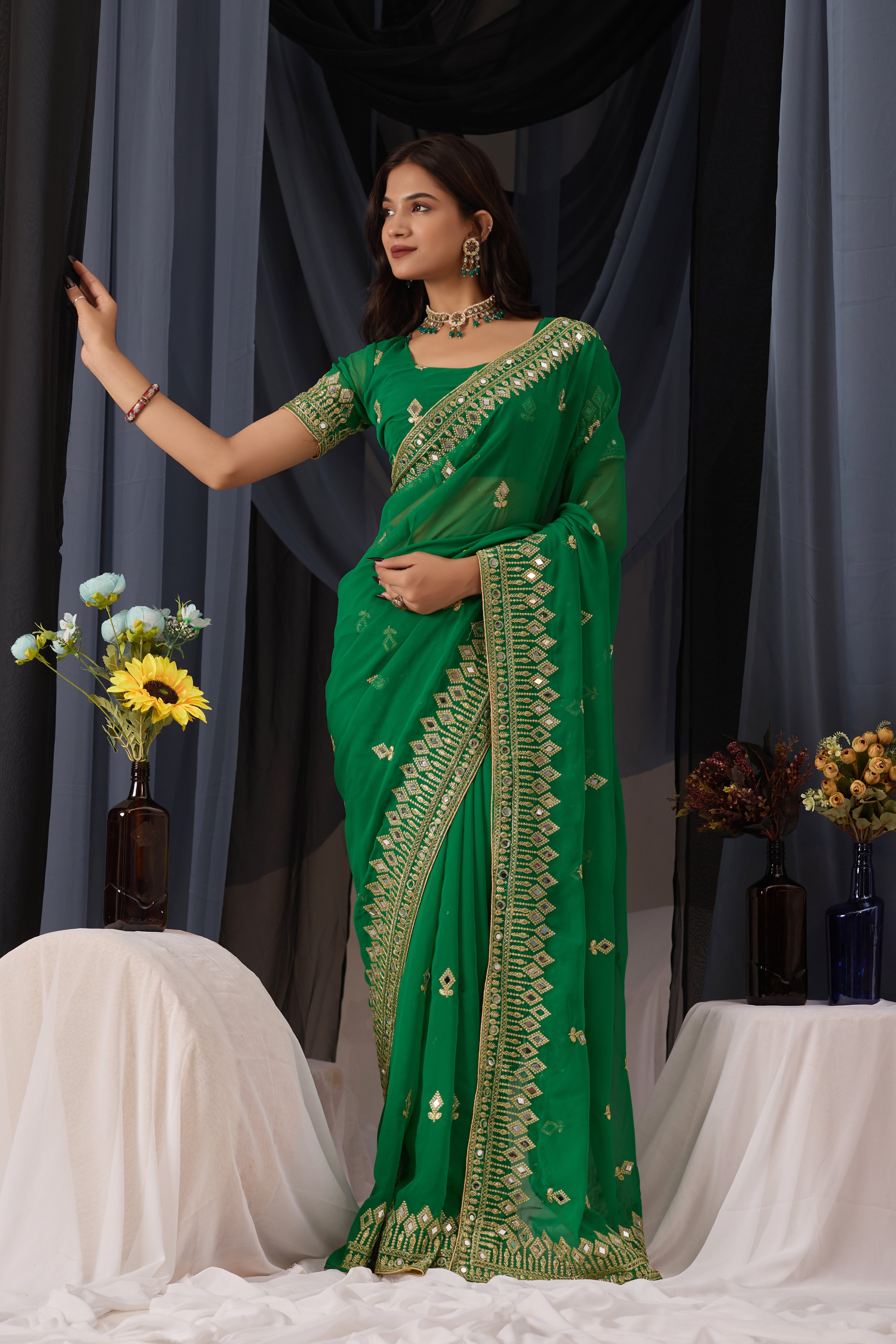Elegant Green Georgette Saree with Golden Embroidered Border