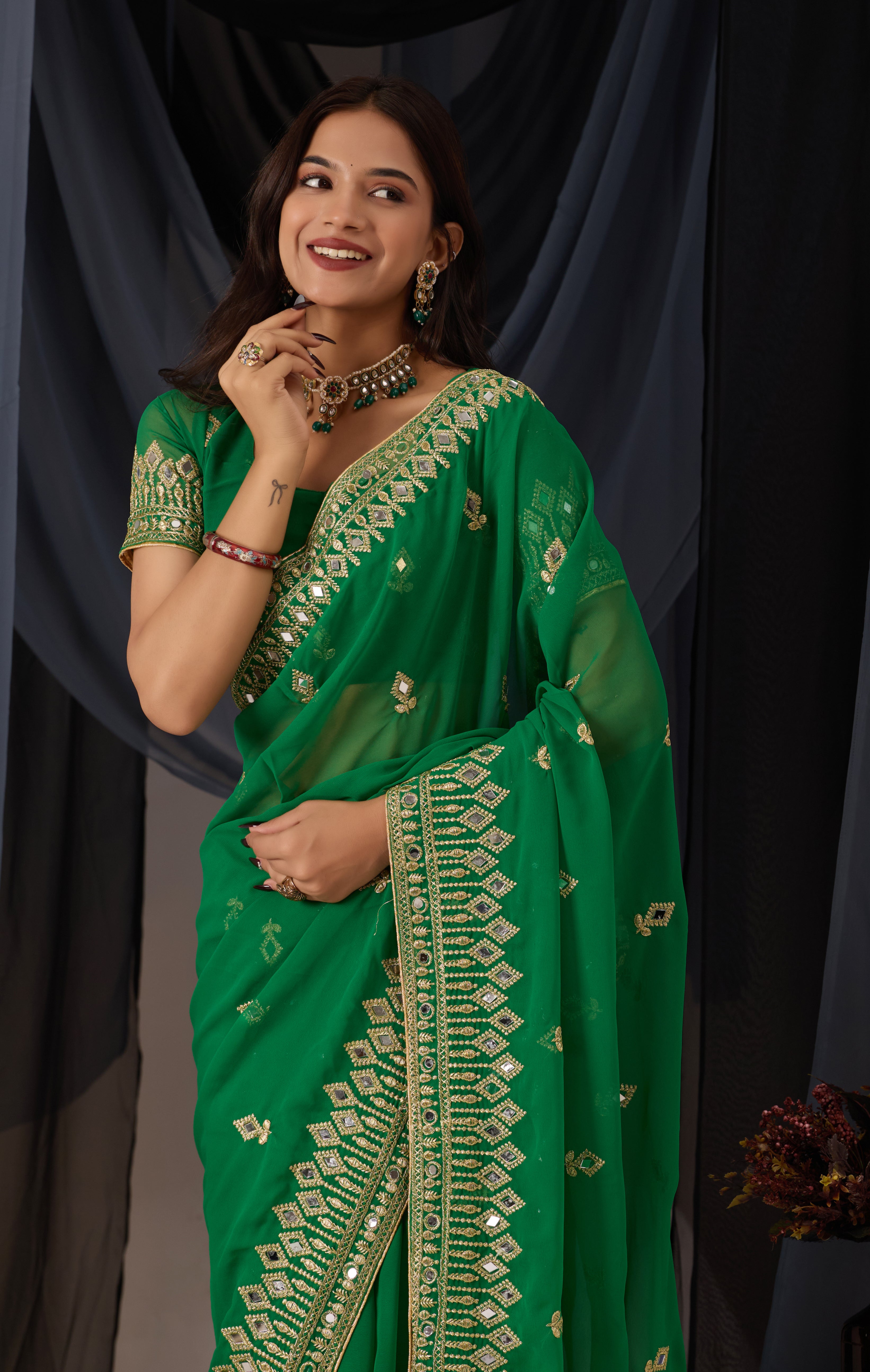 Elegant Green Georgette Saree with Golden Embroidered Border