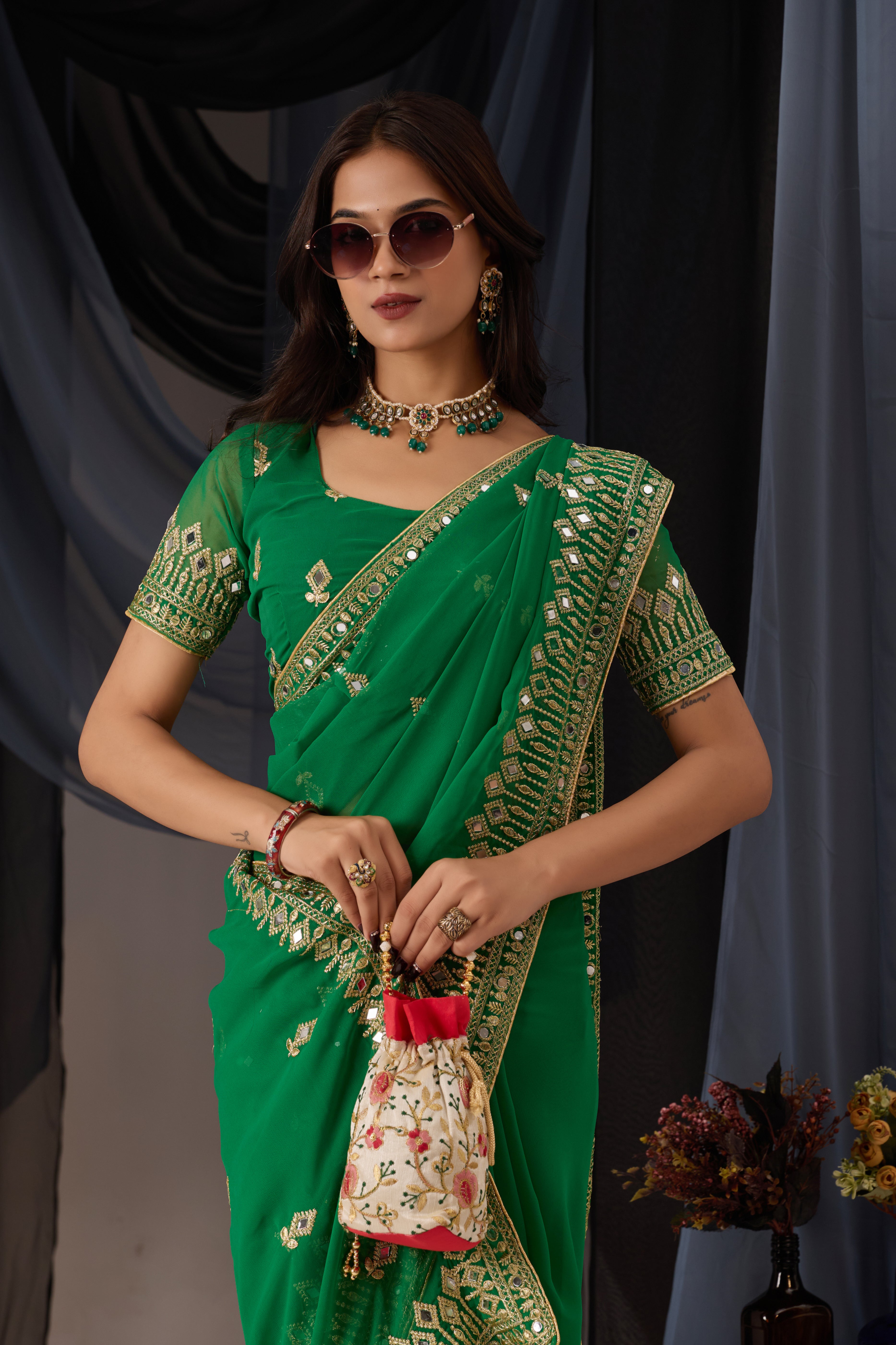 Elegant Green Georgette Saree with Golden Embroidered Border