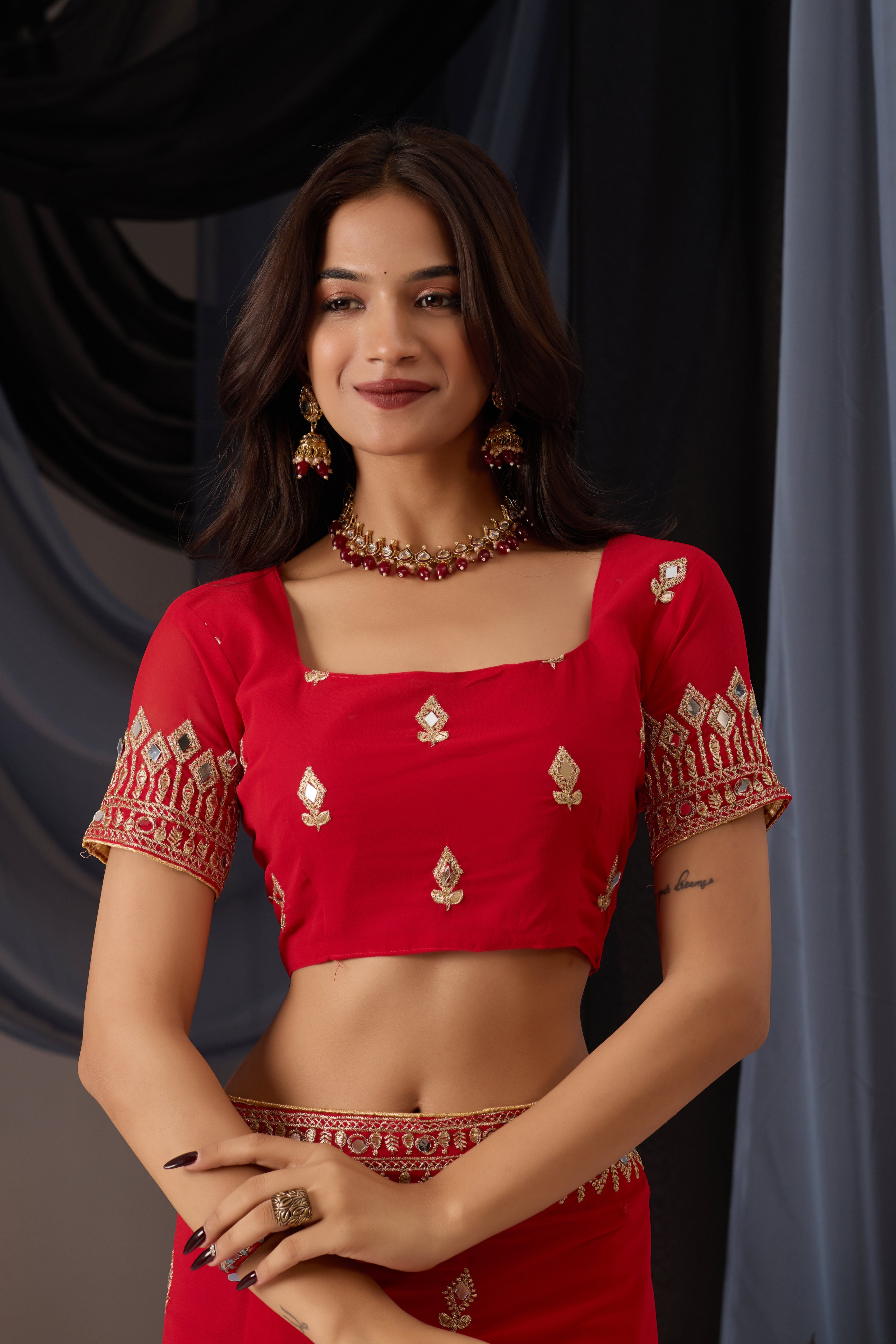 Elegant Red Georgette Saree with Golden Embroidered Border