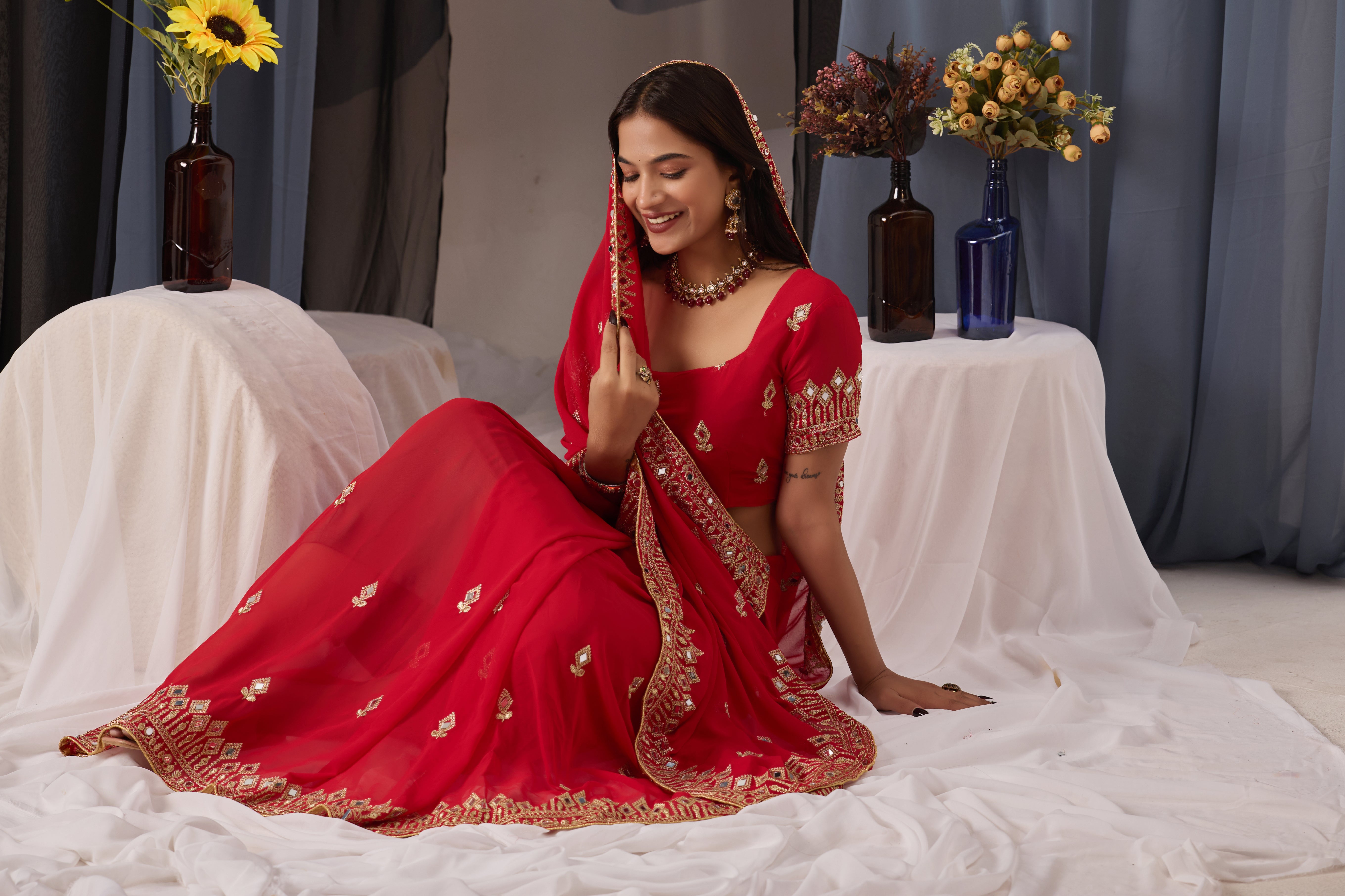 Elegant Red Georgette Saree with Golden Embroidered Border