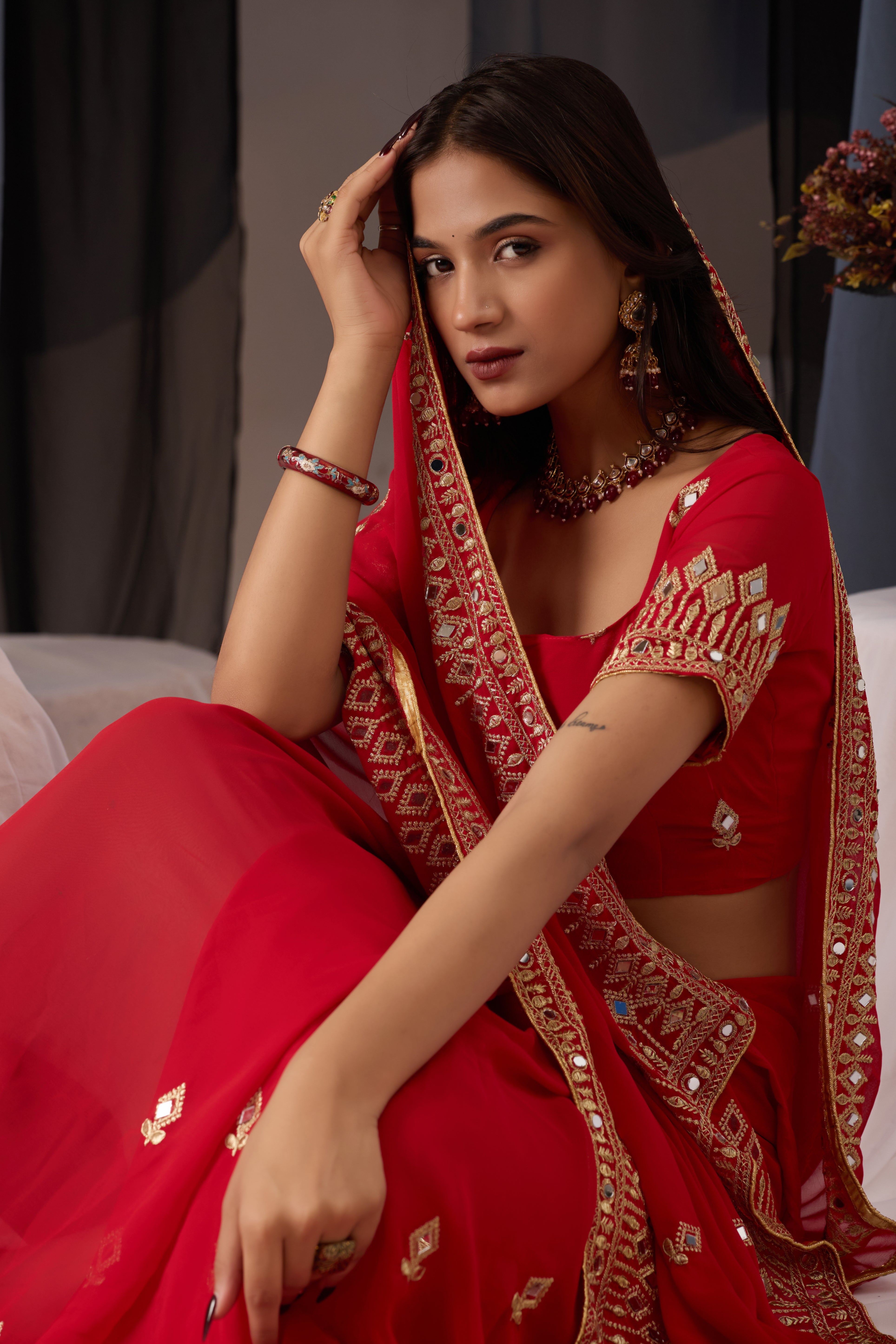 Elegant Red Georgette Saree with Golden Embroidered Border