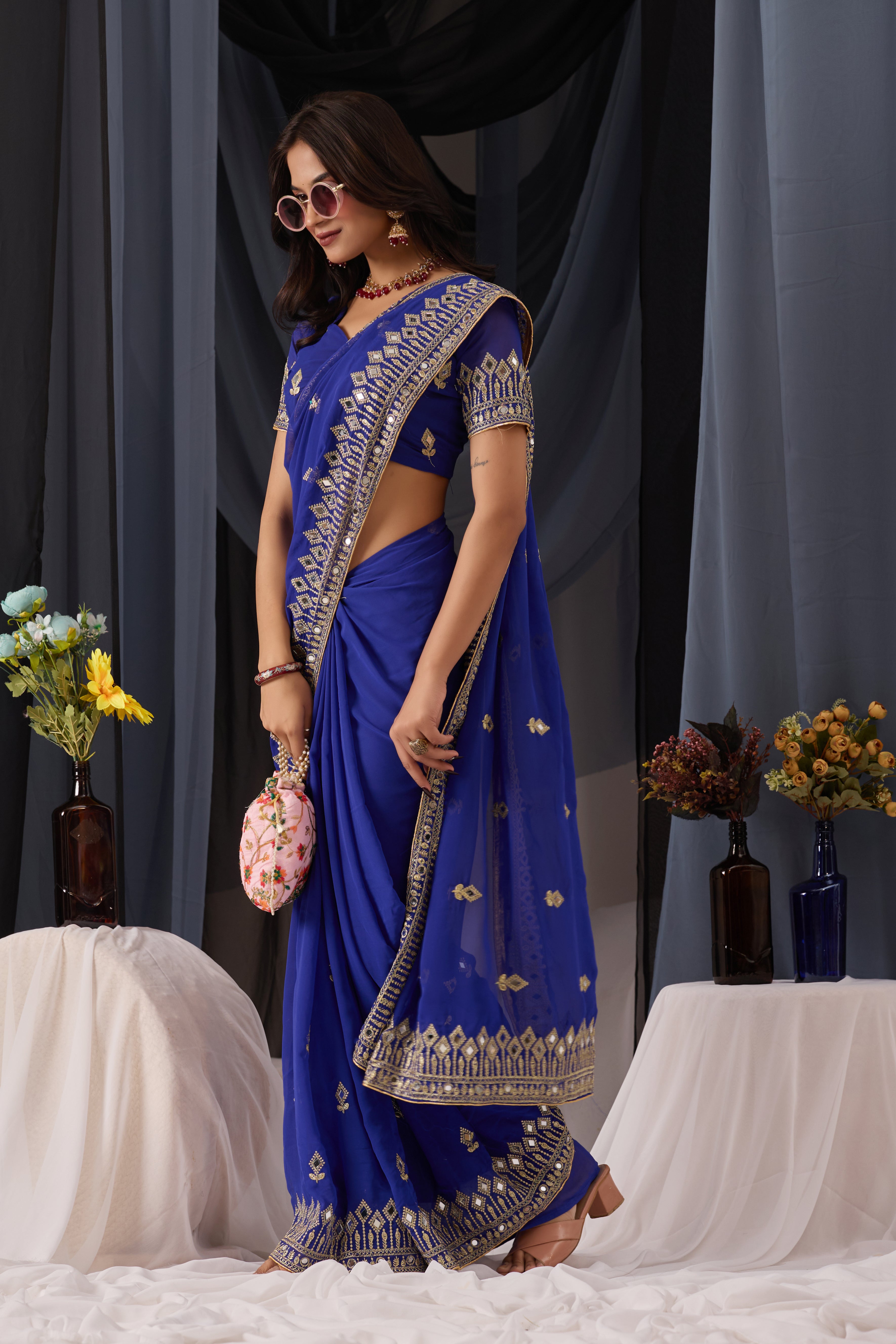 Elegant Blue Georgette Saree with Golden Embroidered Border