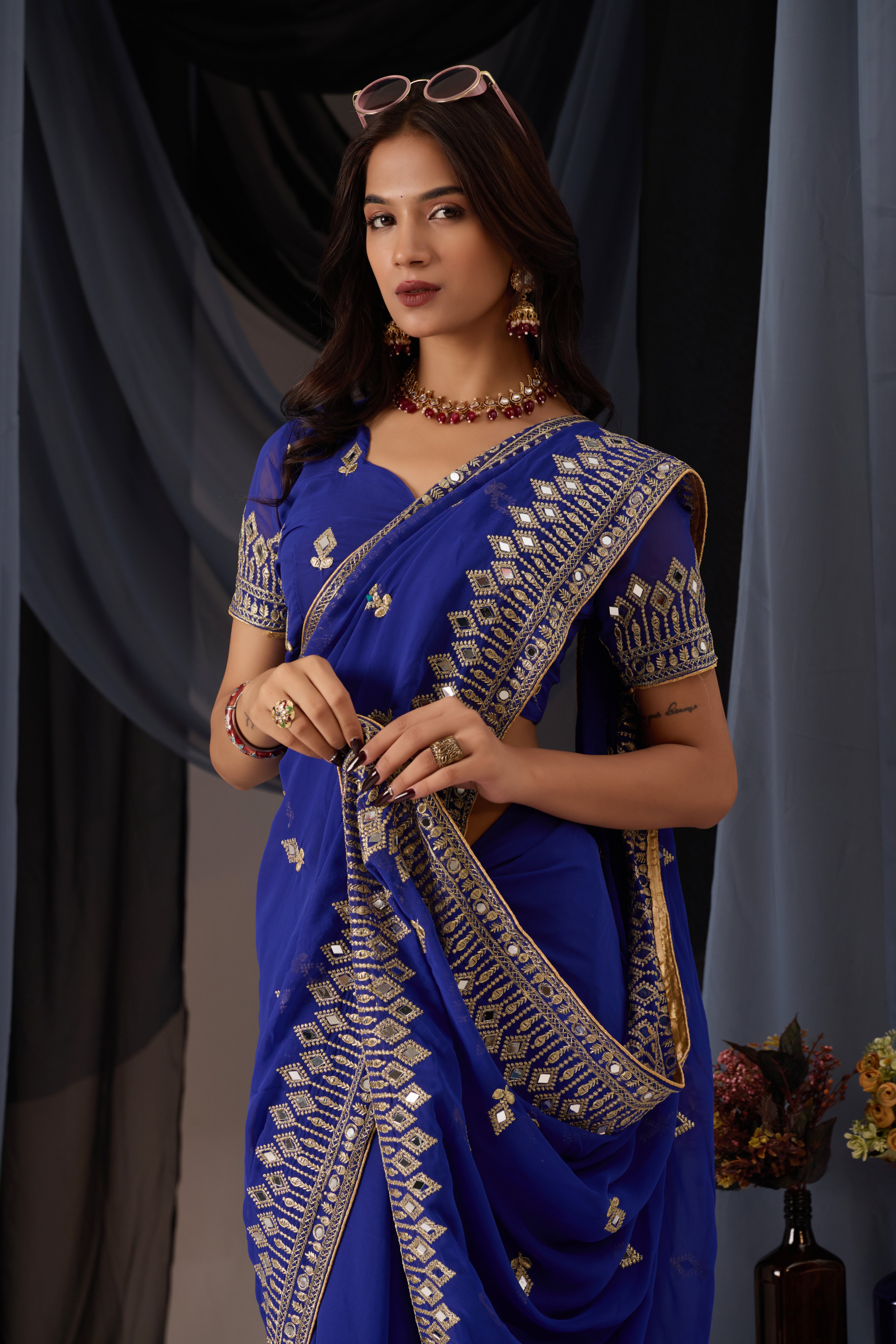 Elegant Blue Georgette Saree with Golden Embroidered Border