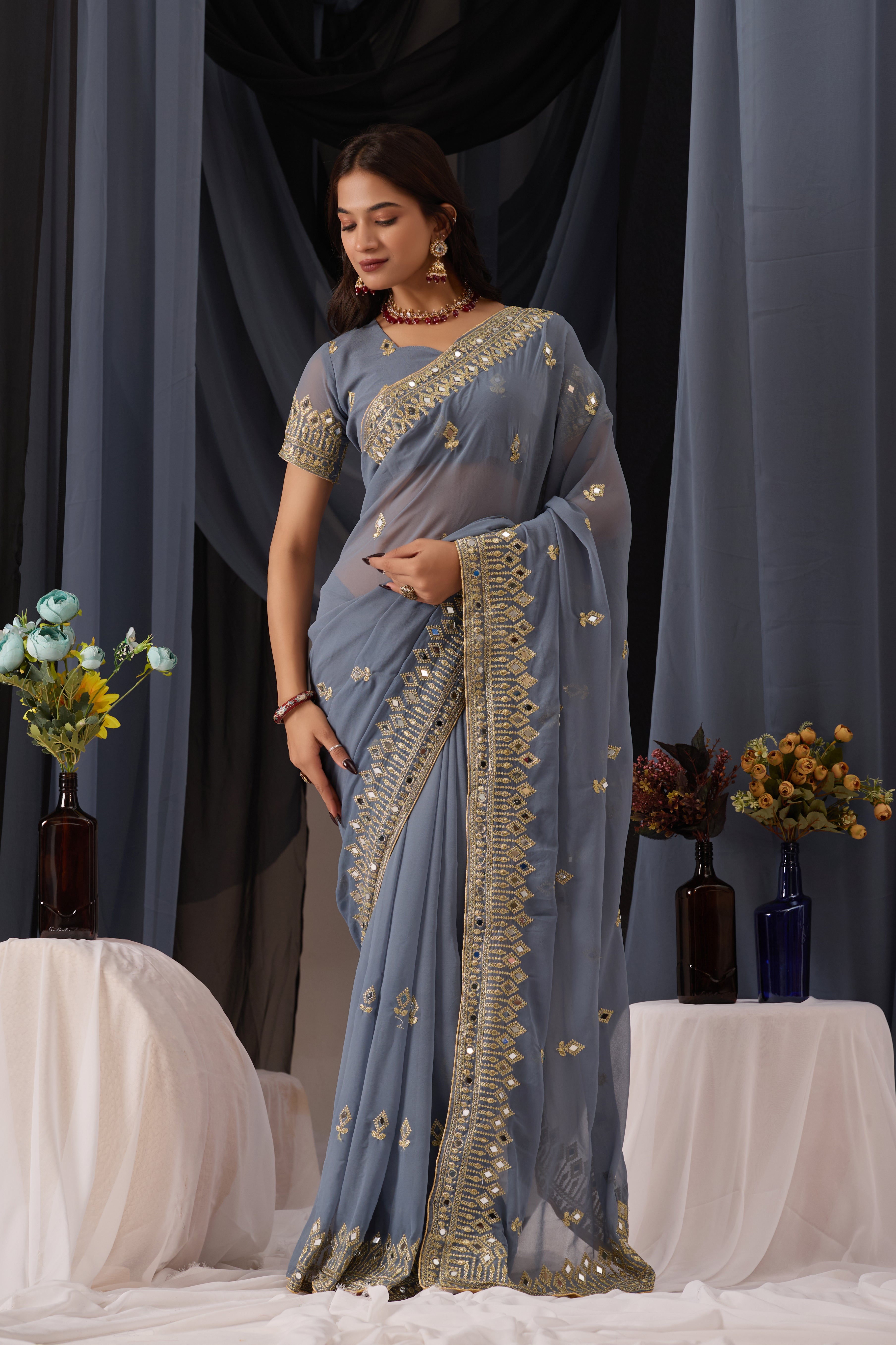 Elegant Gray Georgette Saree with Golden Embroidered Border