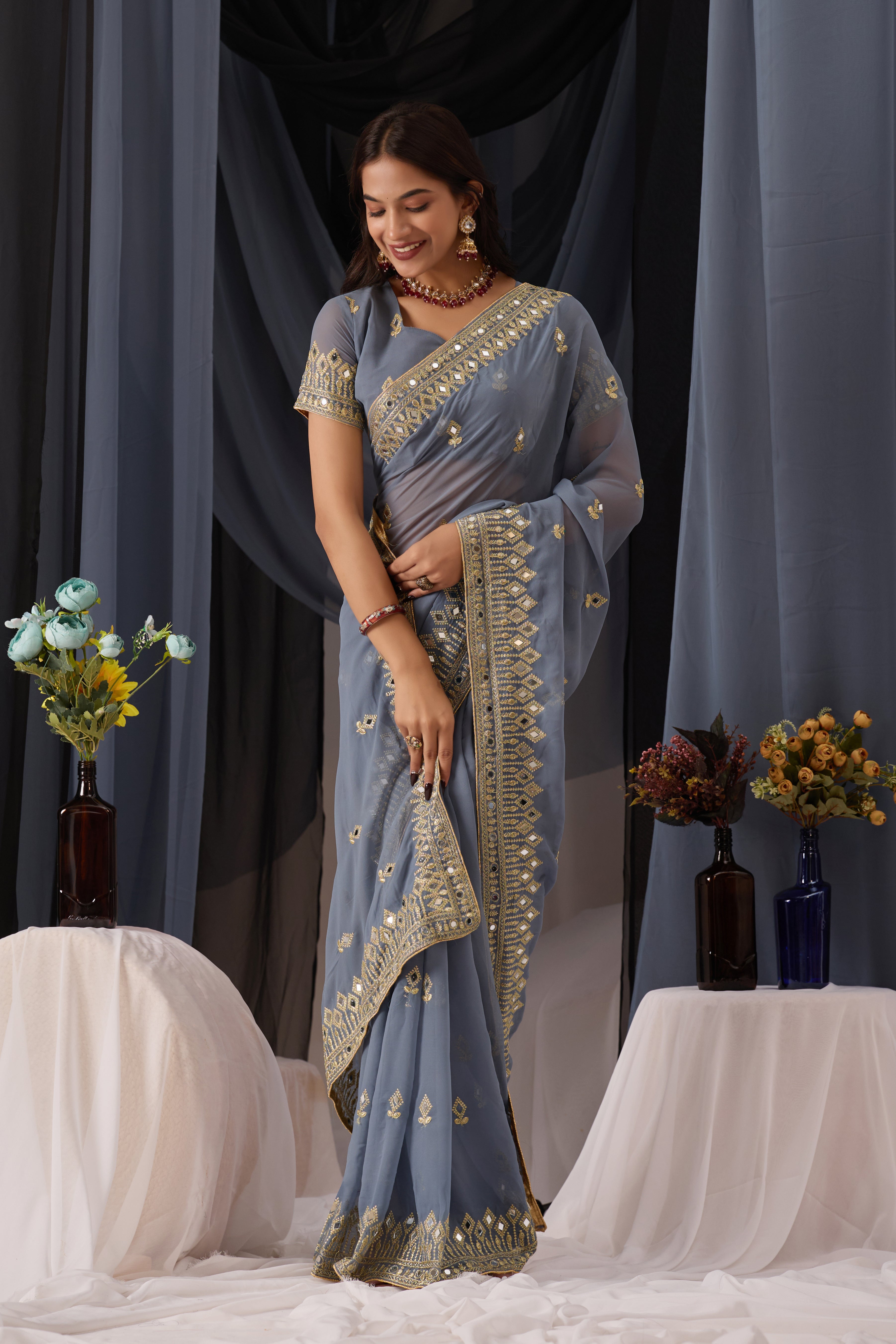 Elegant Gray Georgette Saree with Golden Embroidered Border
