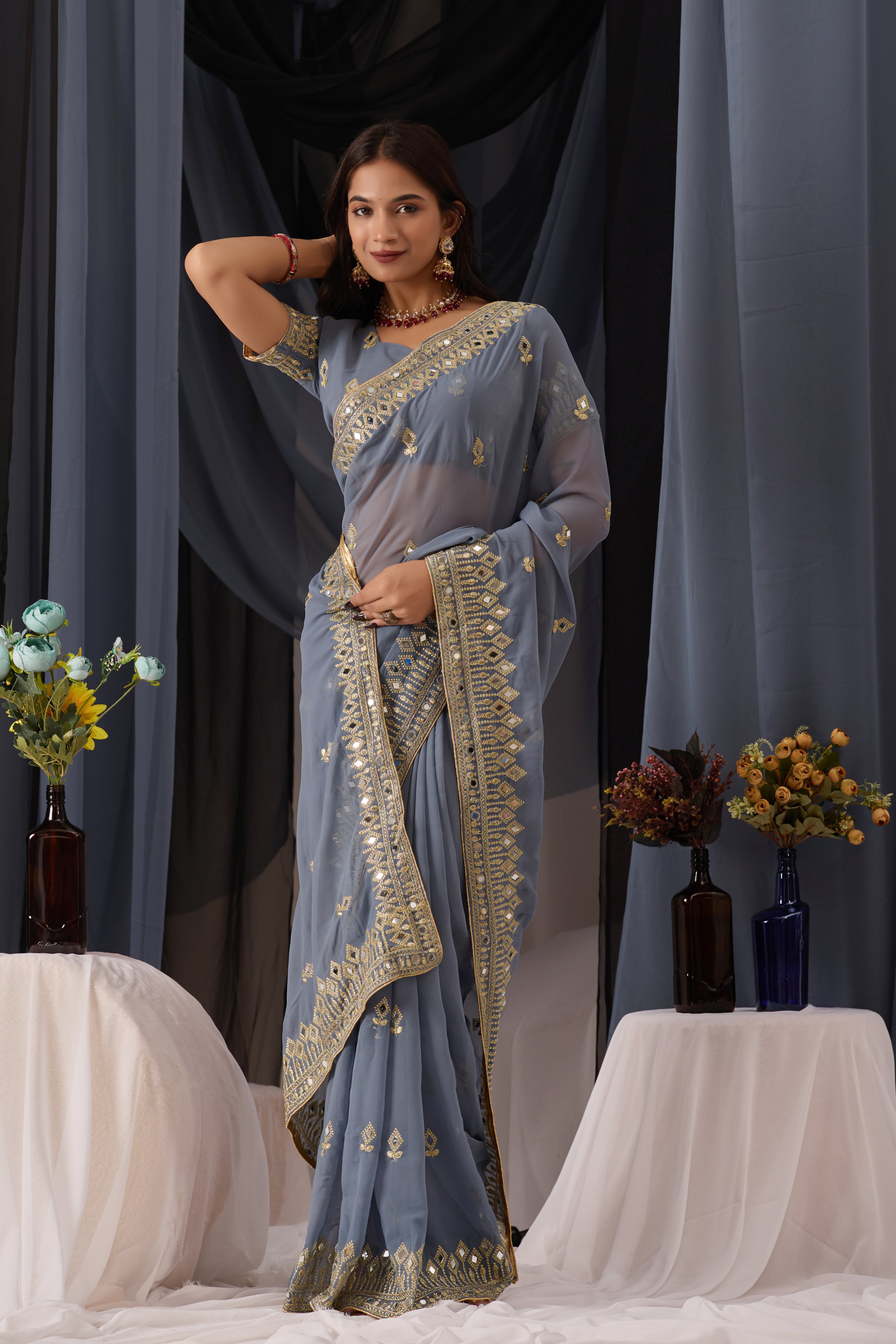 Elegant Gray Georgette Saree with Golden Embroidered Border
