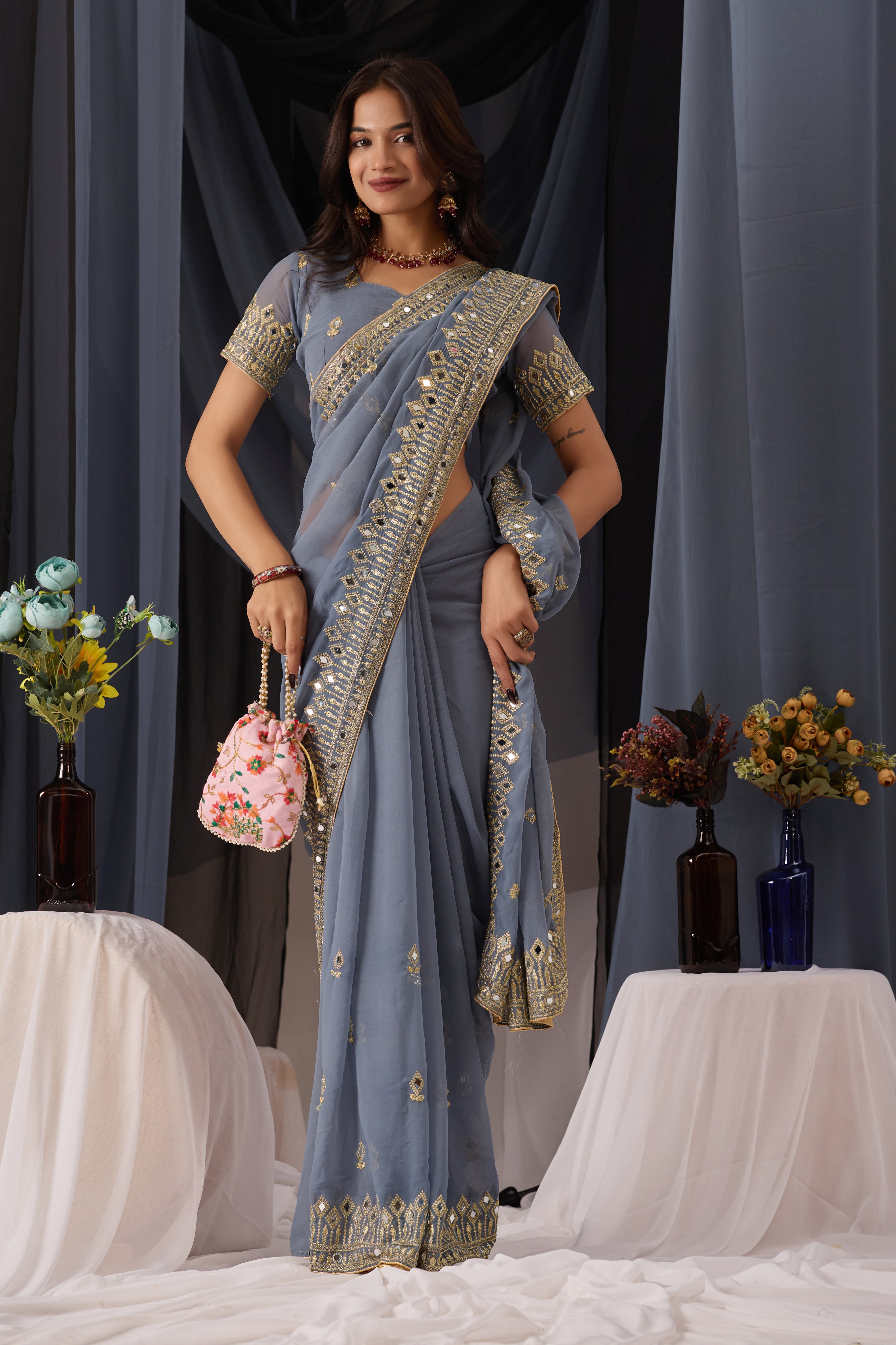 Elegant Gray Georgette Saree with Golden Embroidered Border