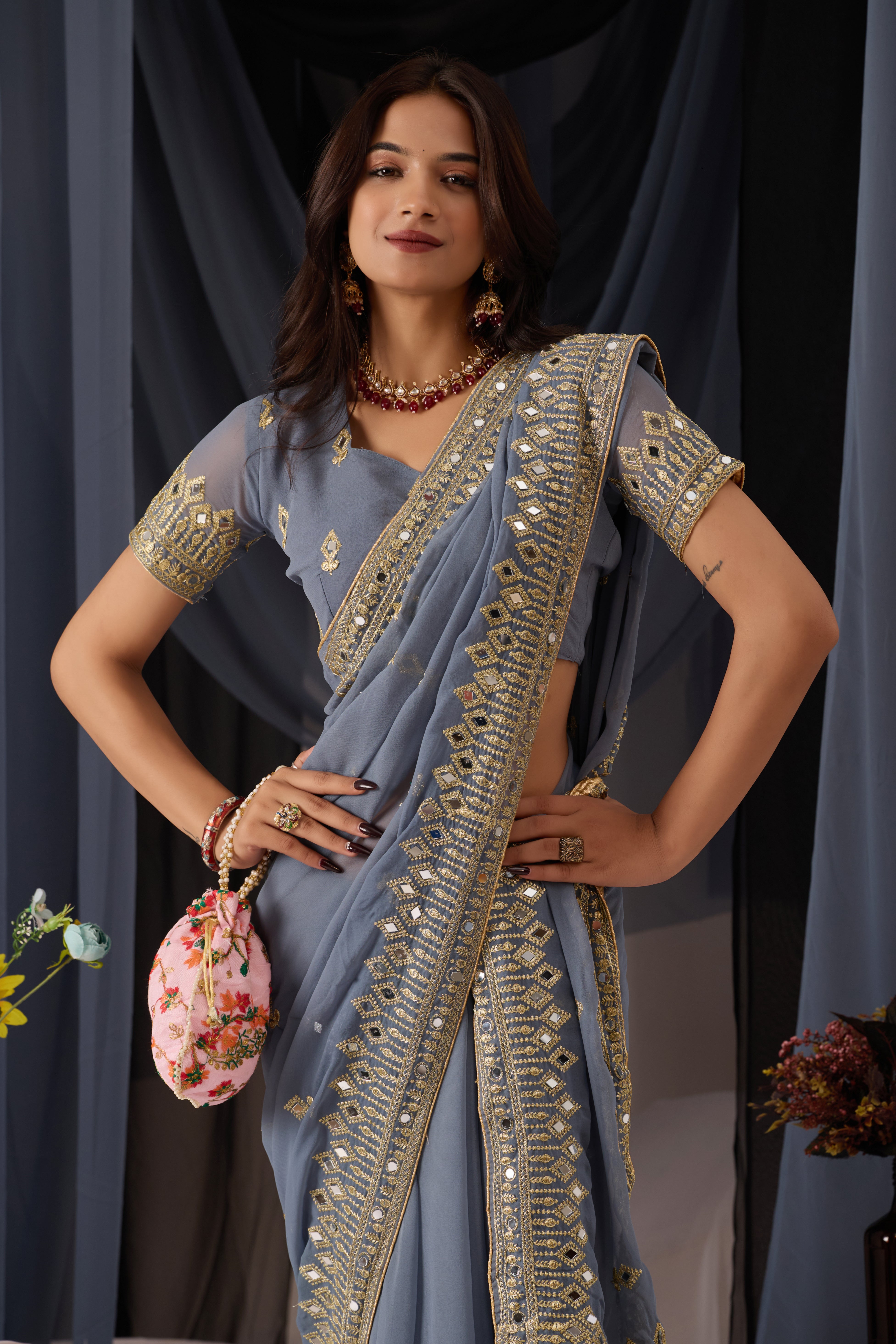 Elegant Gray Georgette Saree with Golden Embroidered Border