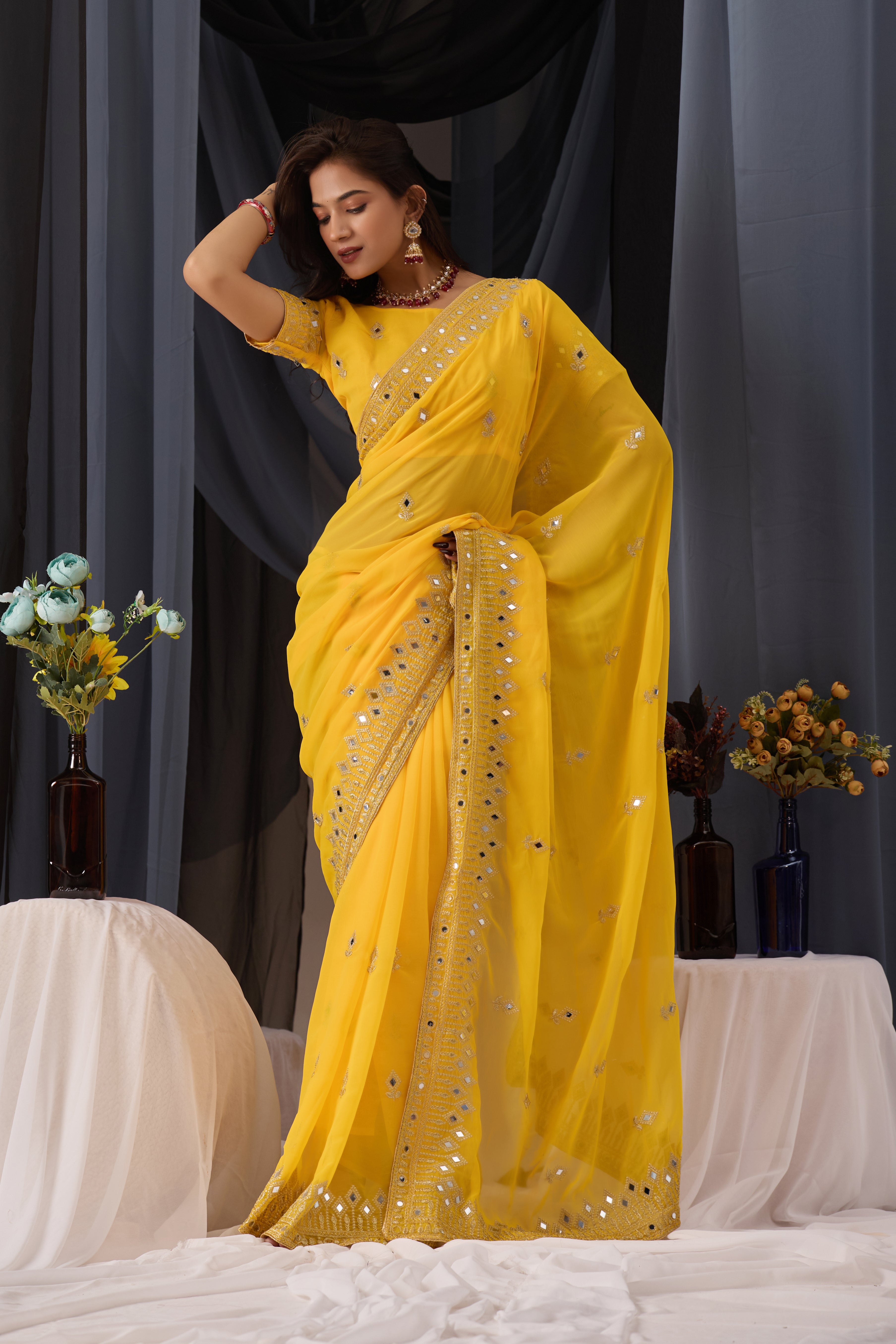 Elegant Yellow Georgette Saree with Golden Embroidered Border