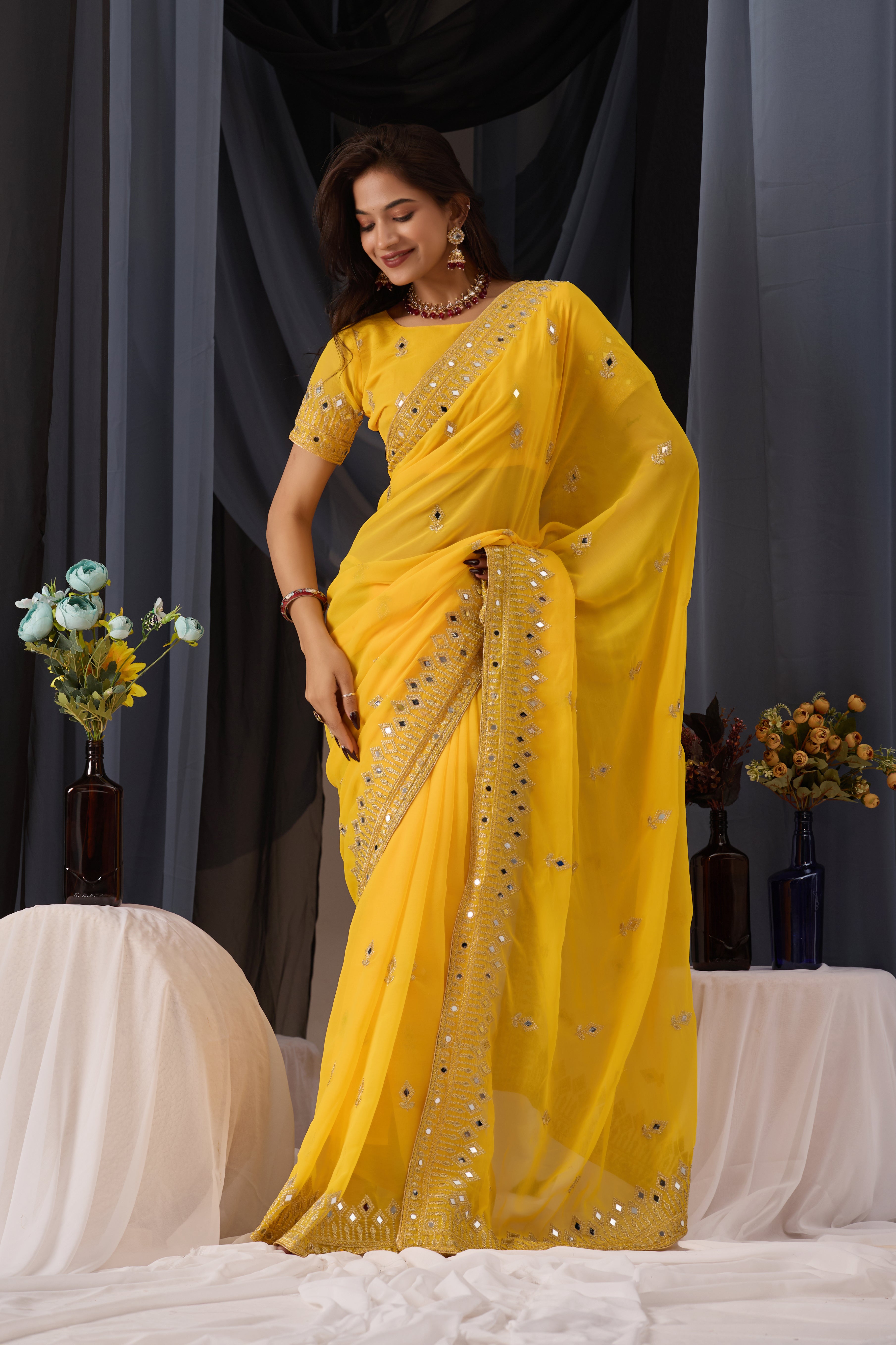 Elegant Yellow Georgette Saree with Golden Embroidered Border