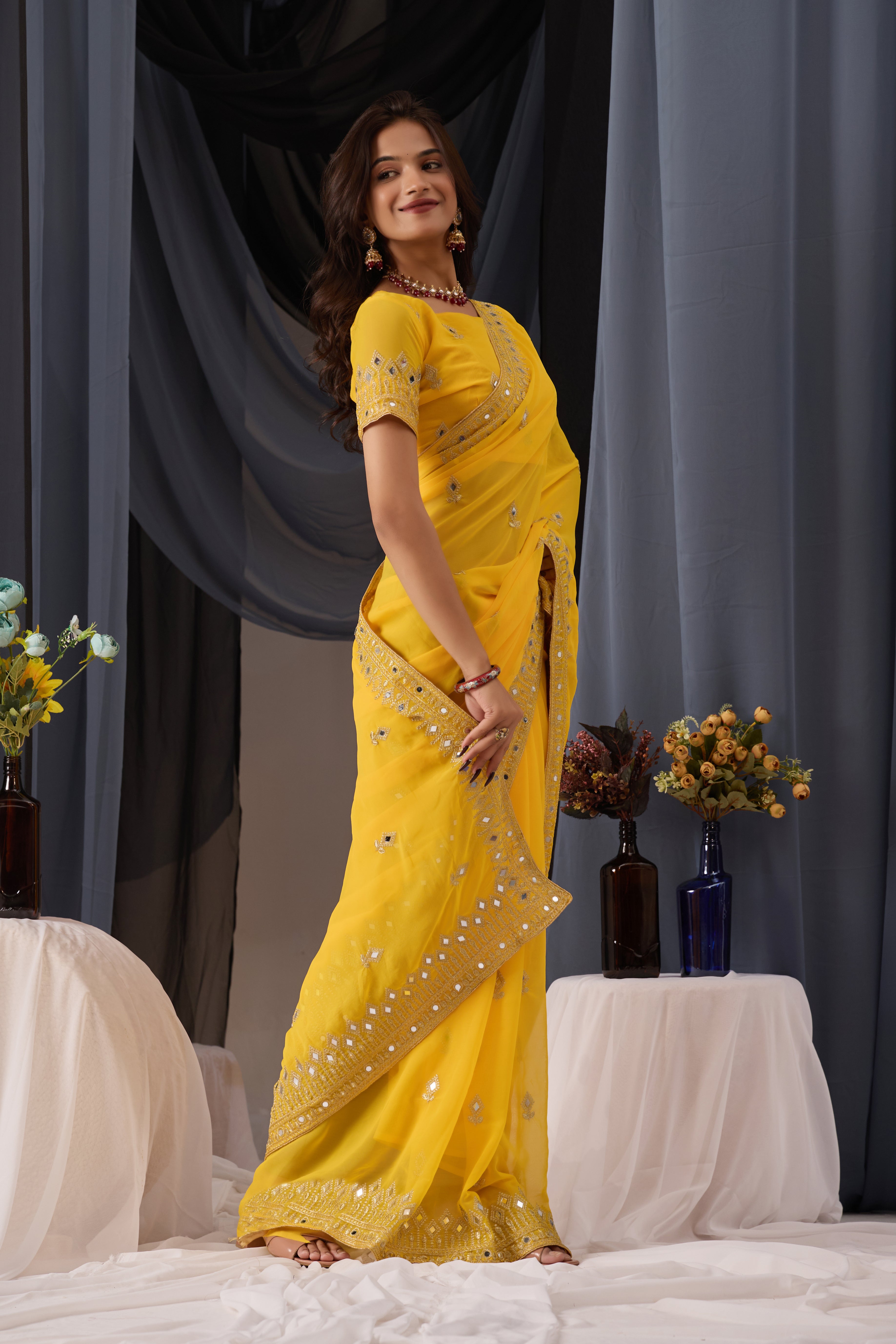 Elegant Yellow Georgette Saree with Golden Embroidered Border