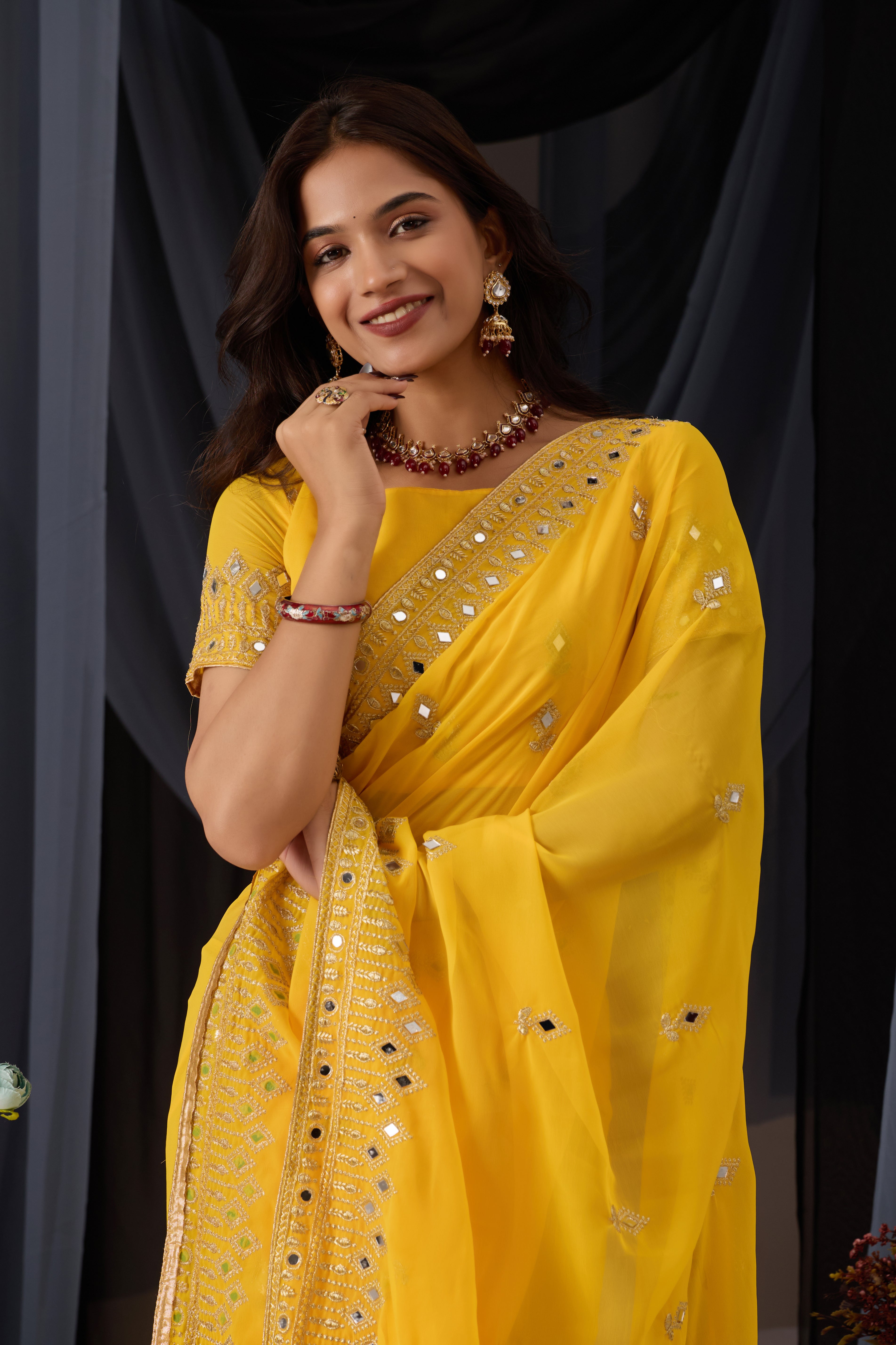 Elegant Yellow Georgette Saree with Golden Embroidered Border