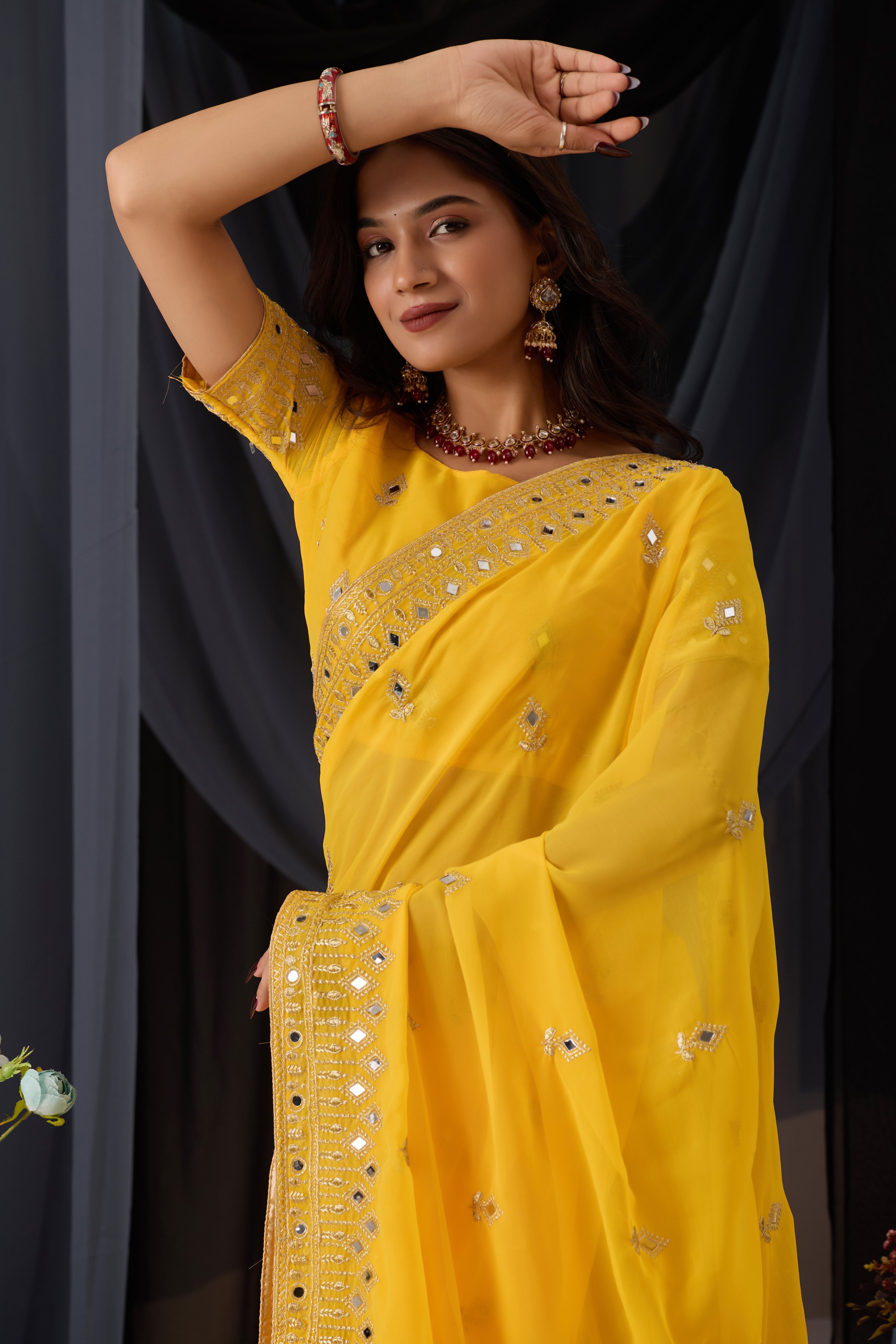 Elegant Yellow Georgette Saree with Golden Embroidered Border