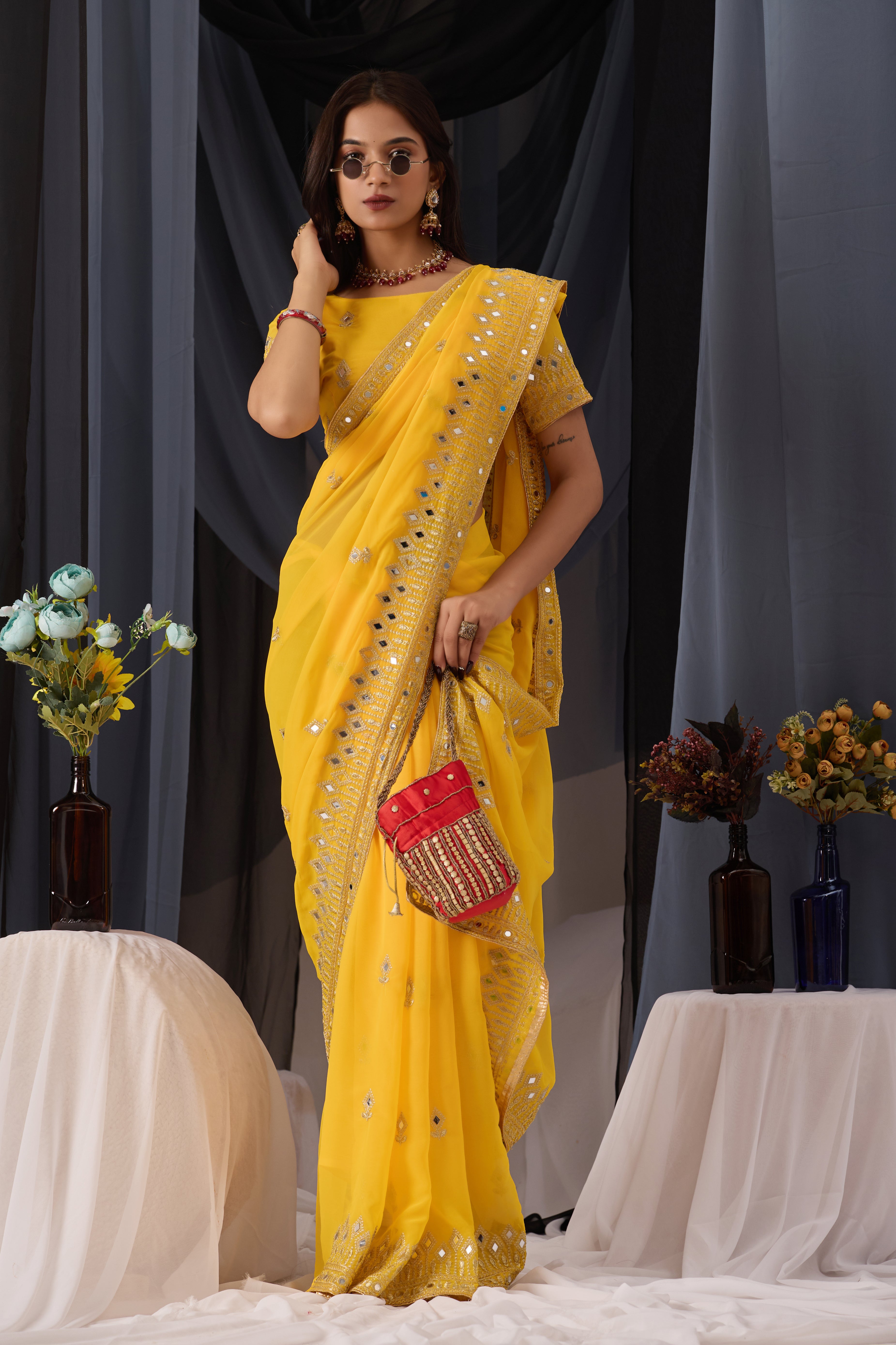 Elegant Yellow Georgette Saree with Golden Embroidered Border