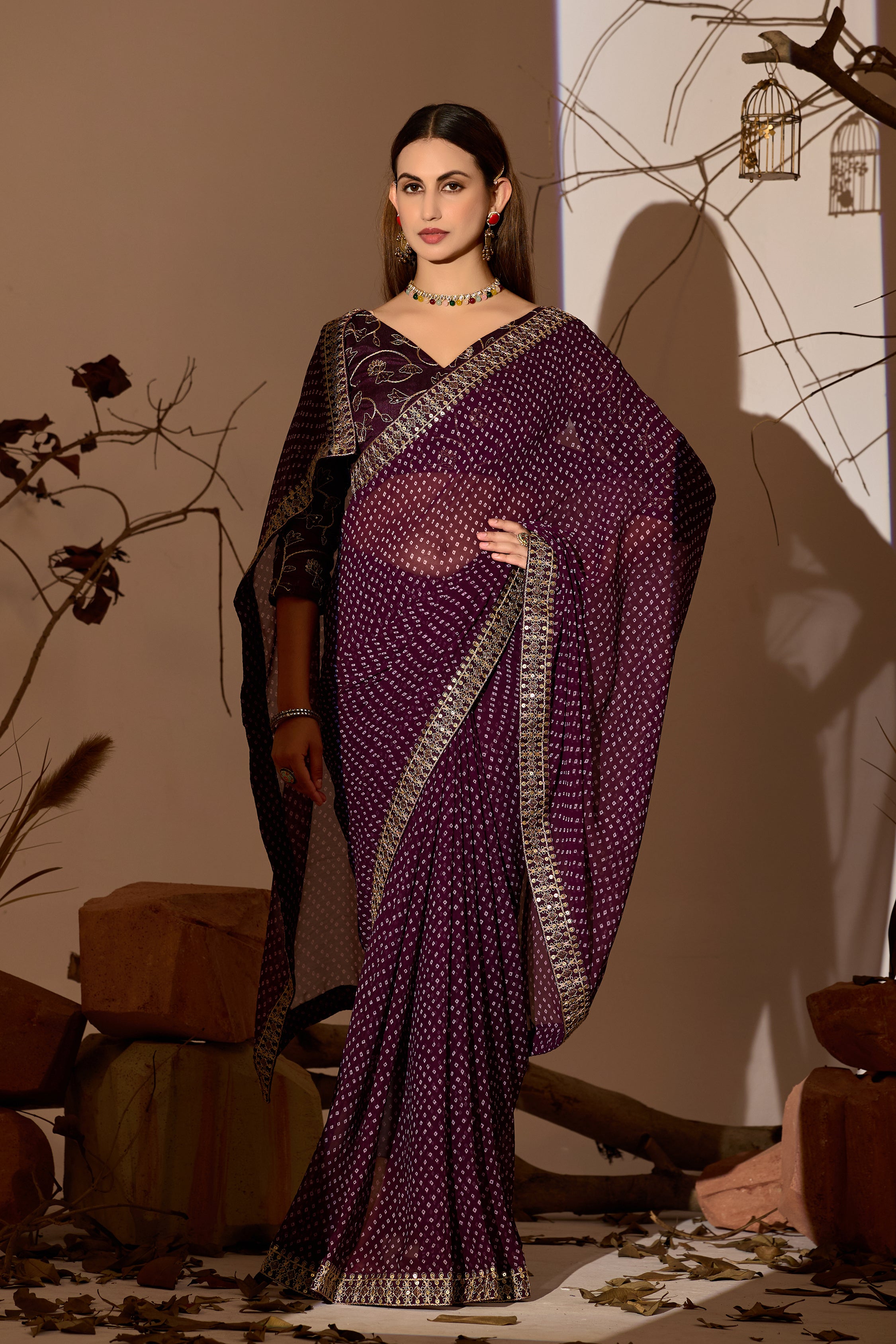 Midnight Elegance Georgette Saree with Golden Embellished Border