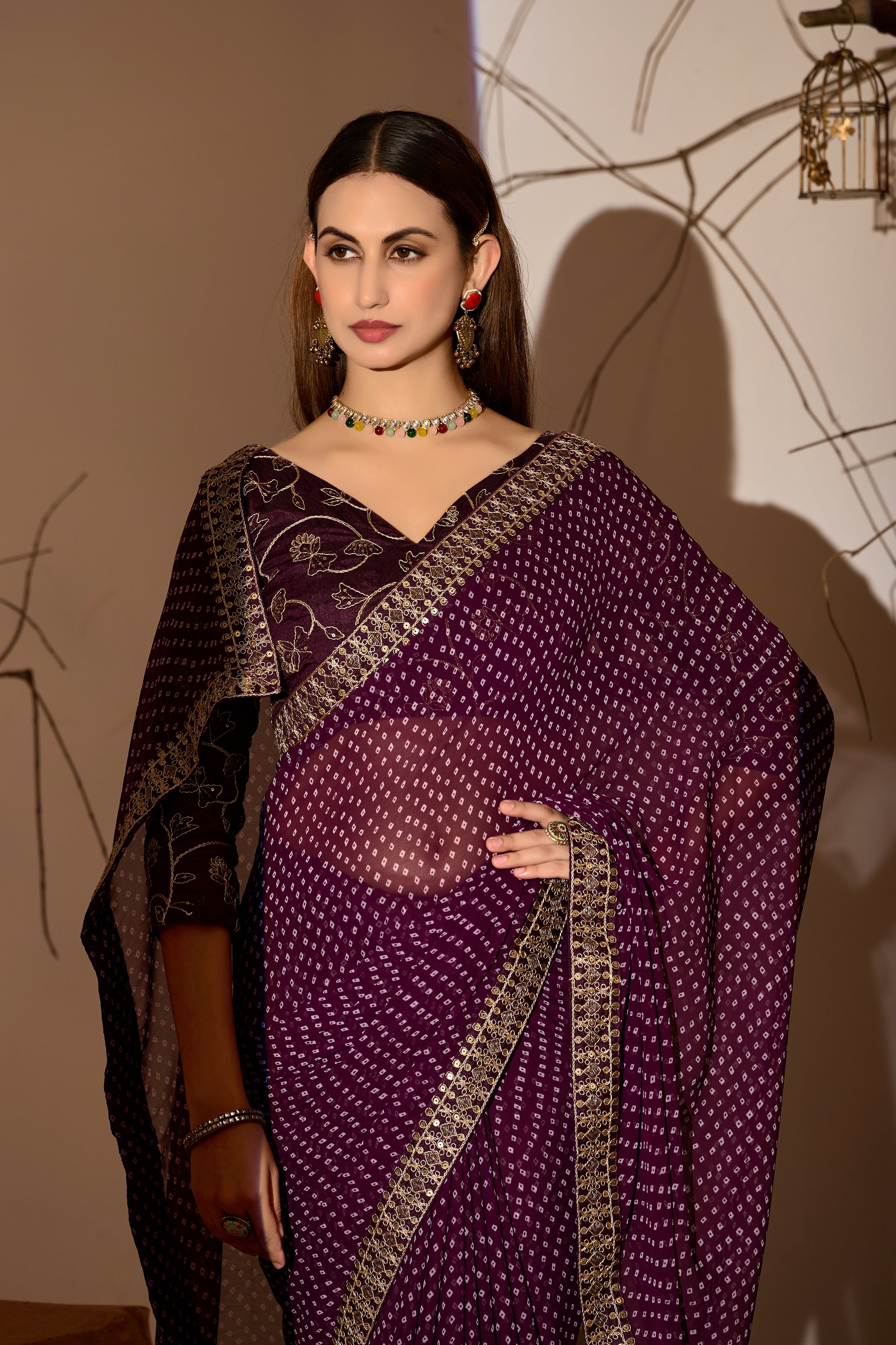 Midnight Elegance Georgette Saree with Golden Embellished Border