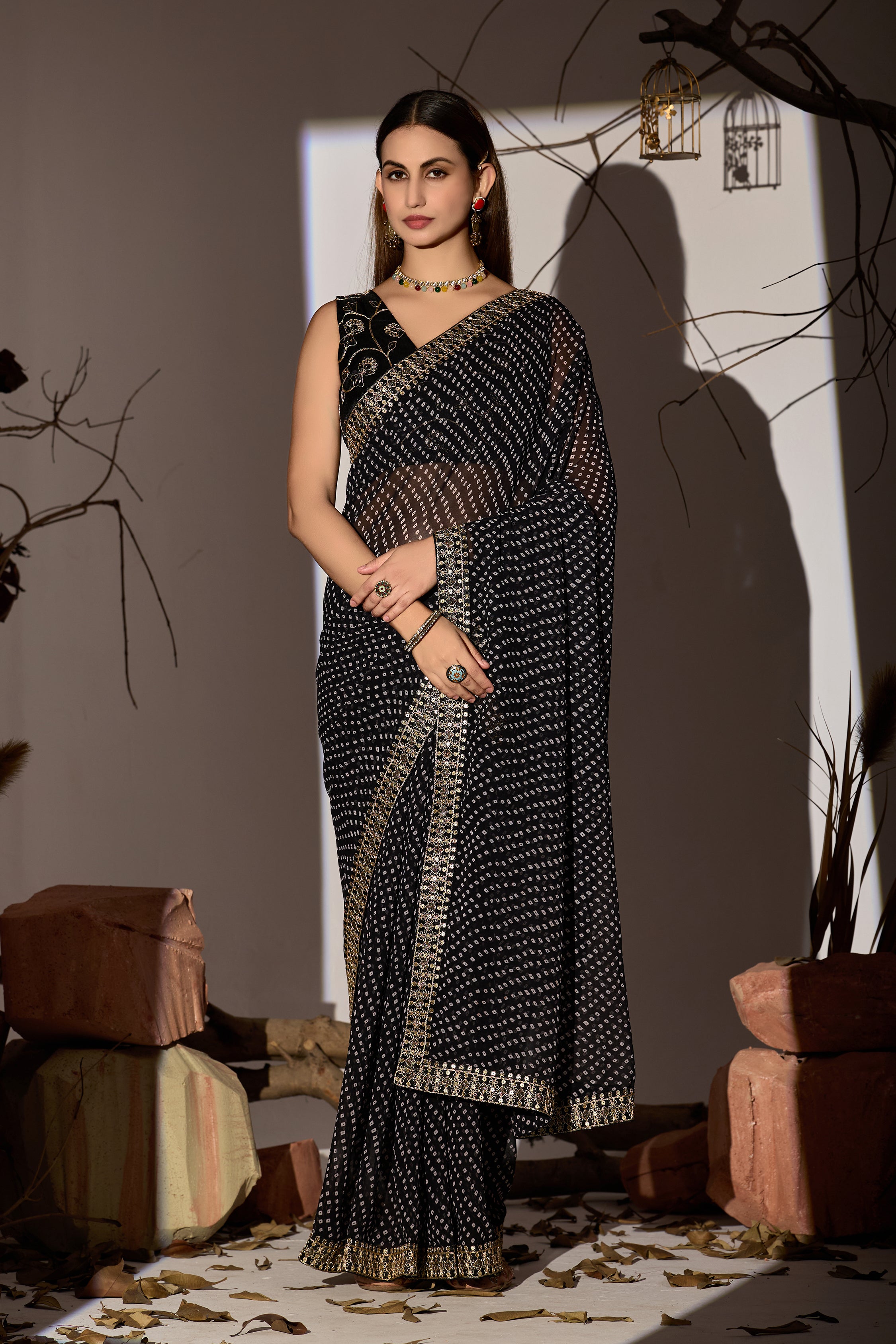 Midnight Elegance Black Georgette Saree with Golden Embellished Border