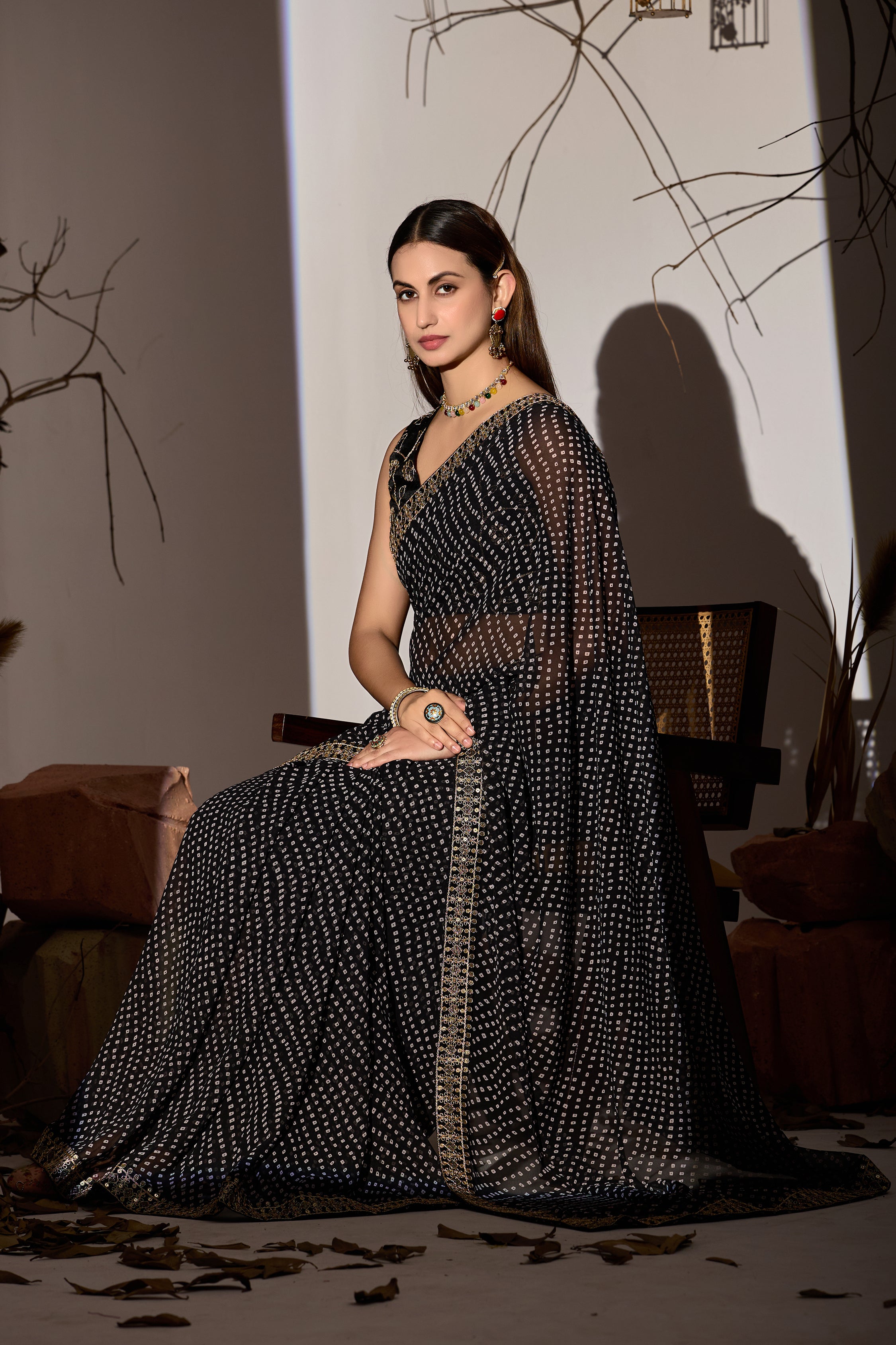 Midnight Elegance Black Georgette Saree with Golden Embellished Border