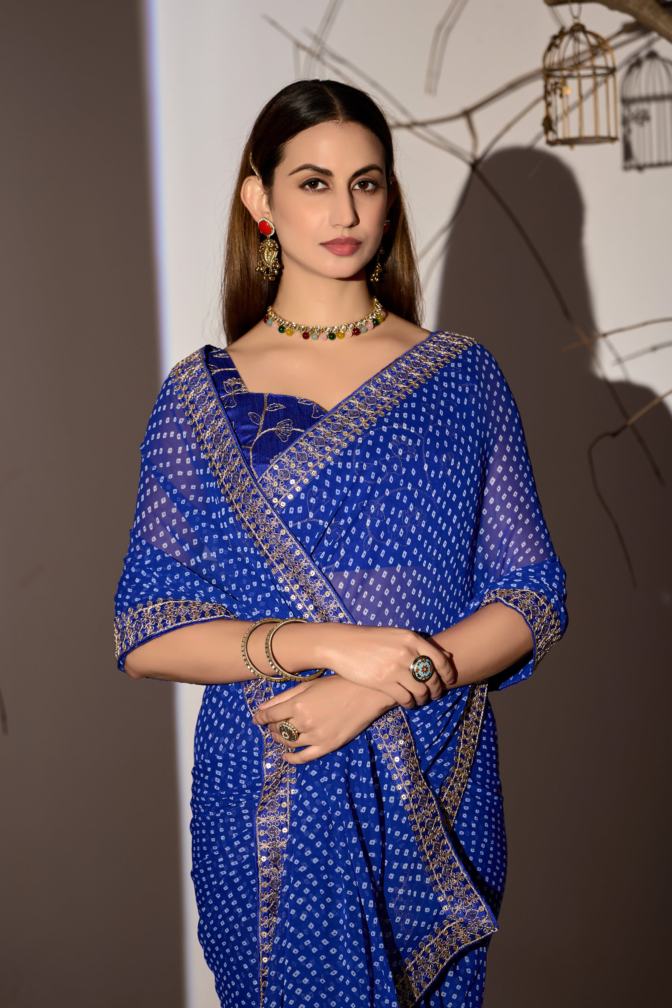 Midnight Elegance Royal Blue Georgette Saree with Golden Embellished Border