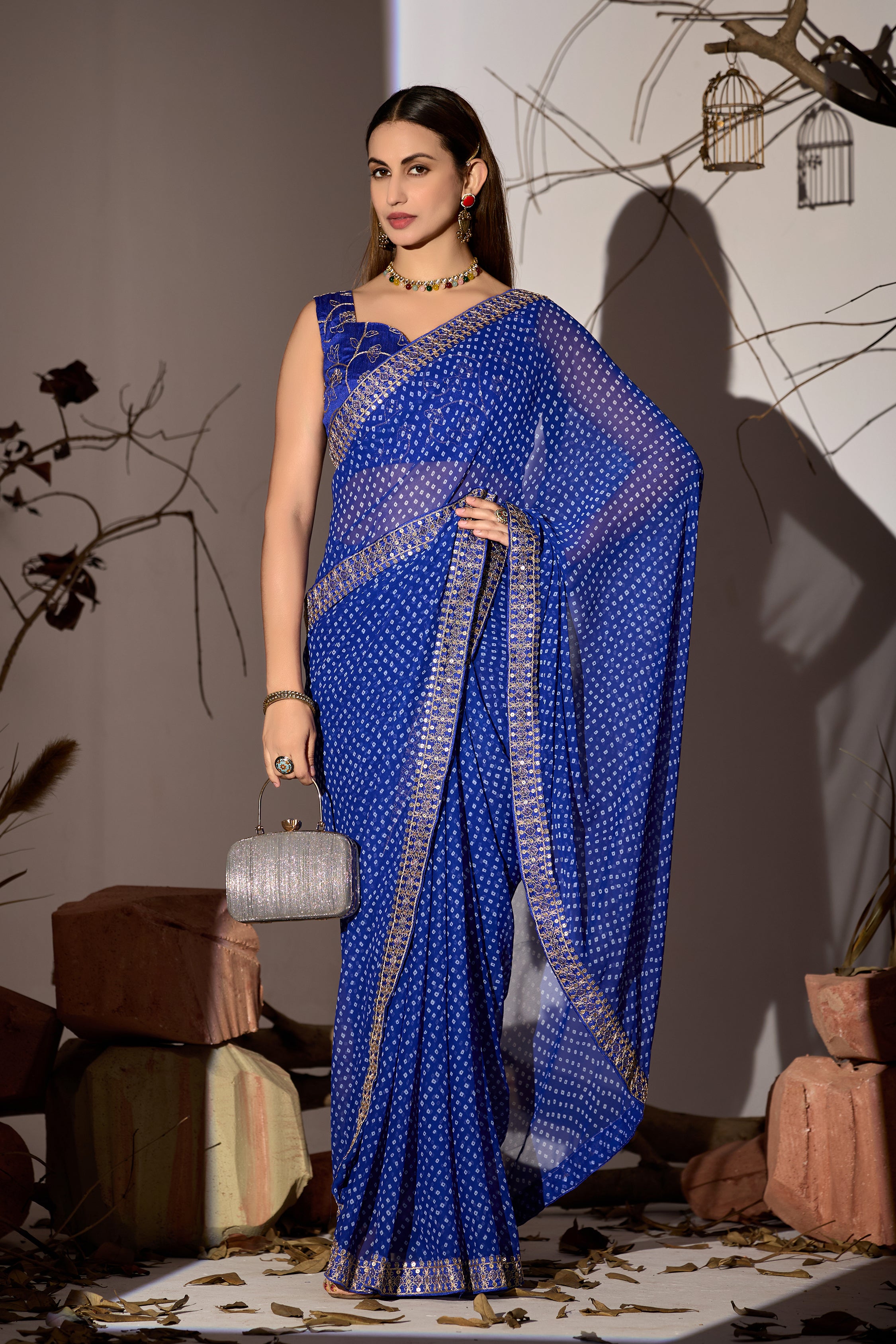 Midnight Elegance Royal Blue Georgette Saree with Golden Embellished Border