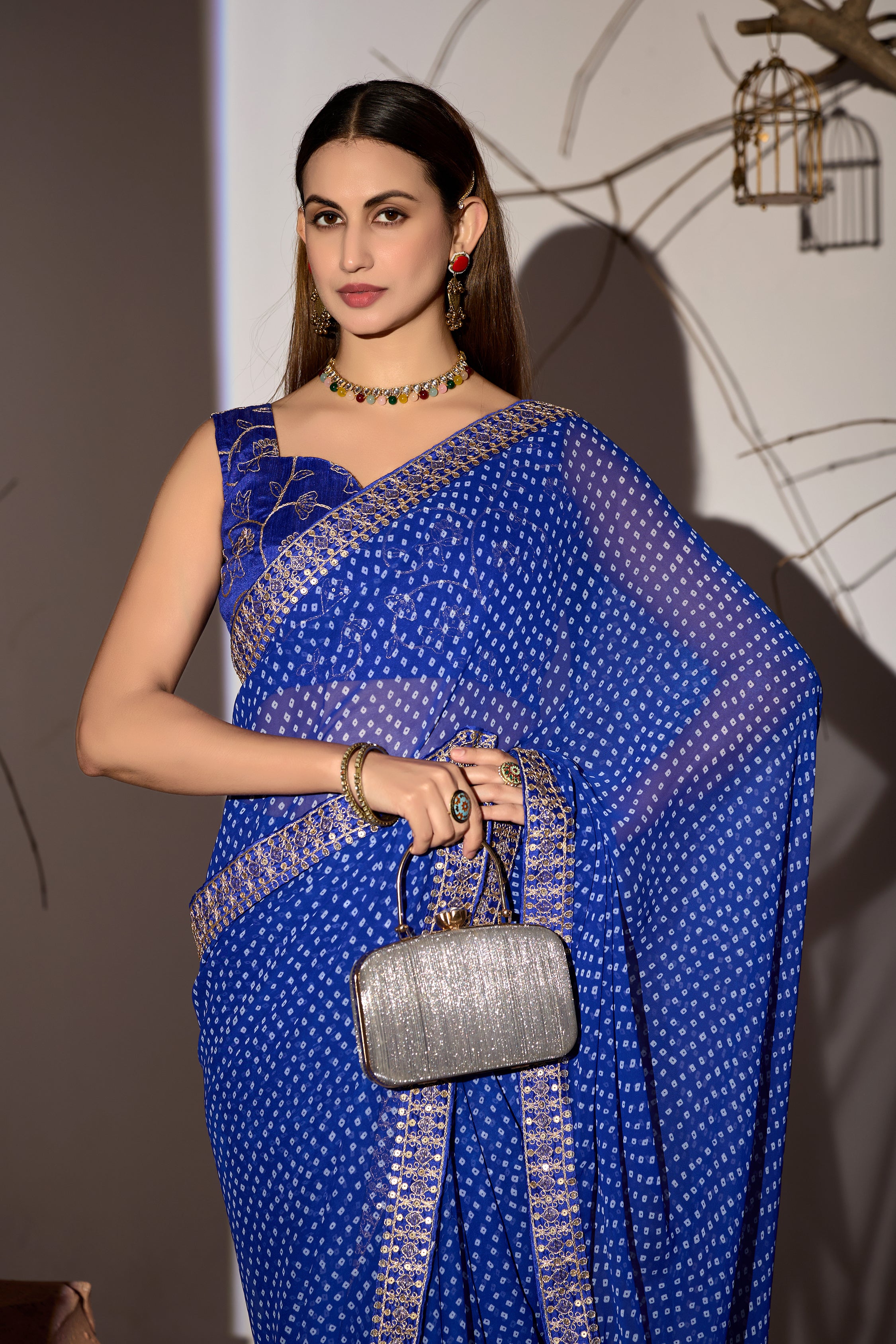 Midnight Elegance Royal Blue Georgette Saree with Golden Embellished Border