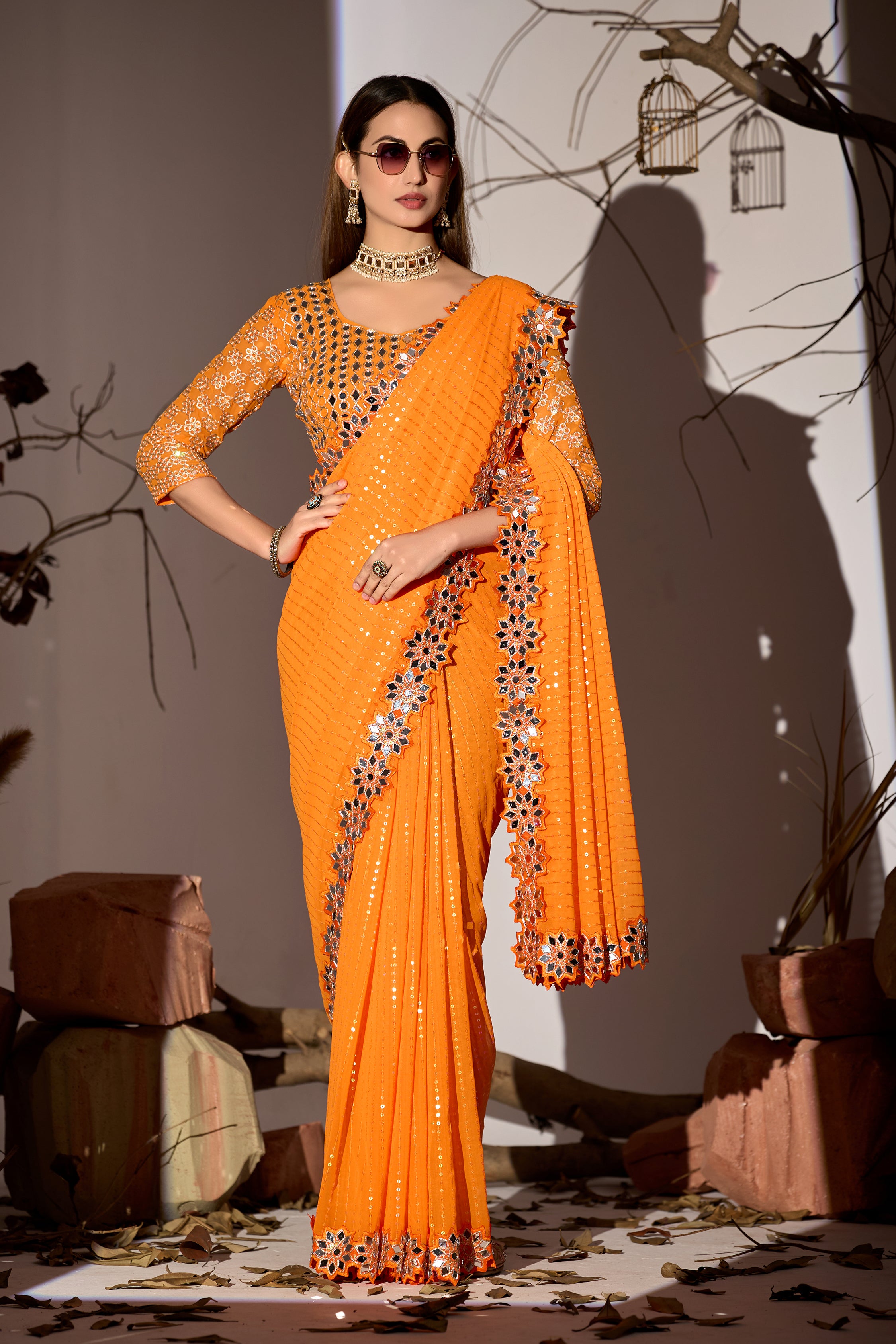 Radiant Tangerine Georgette Saree with Mirror-Work Border