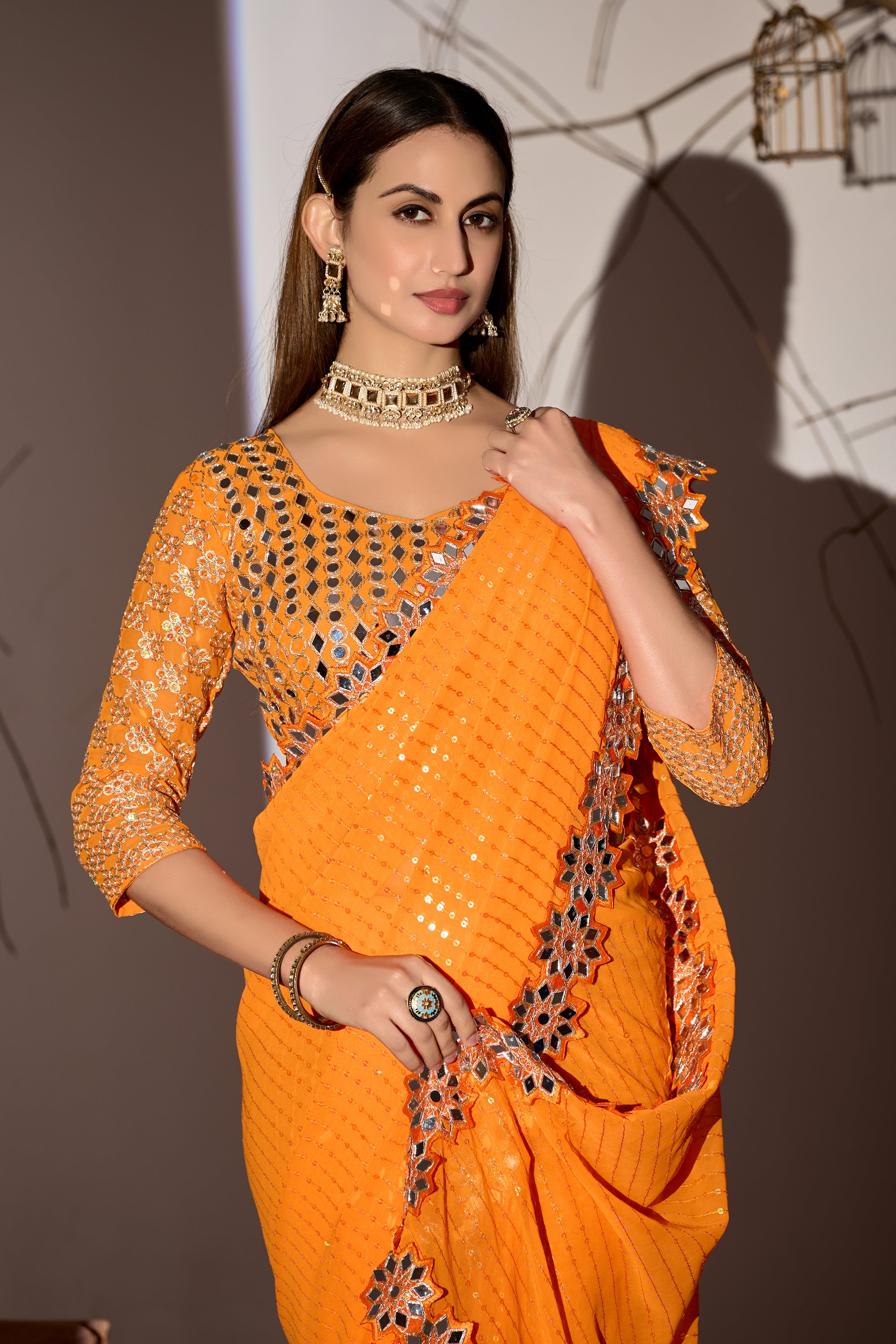 Radiant Tangerine Georgette Saree with Mirror-Work Border