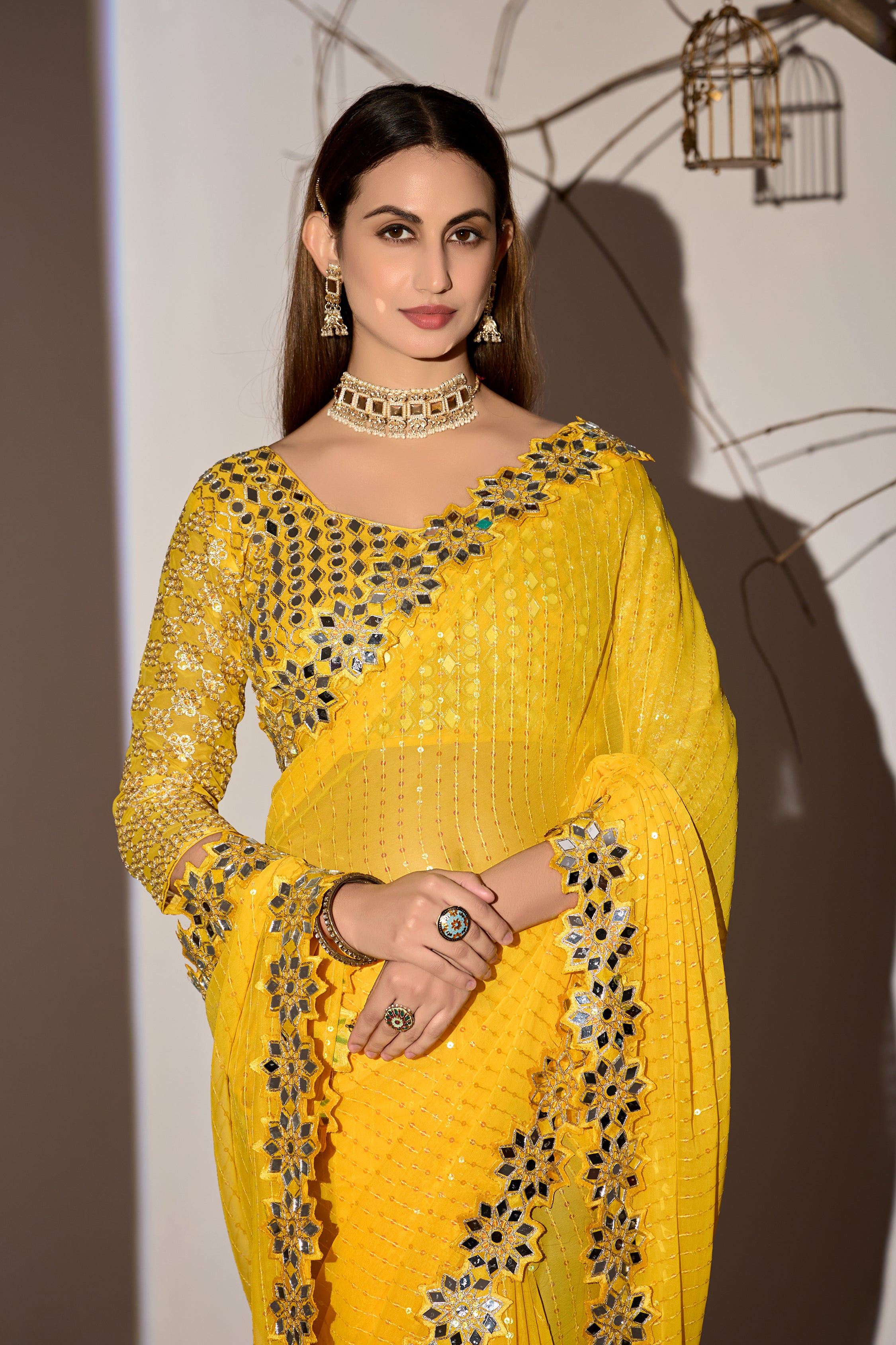 Radiant Tangerine Yellow Georgette Saree with Mirror-Work Border