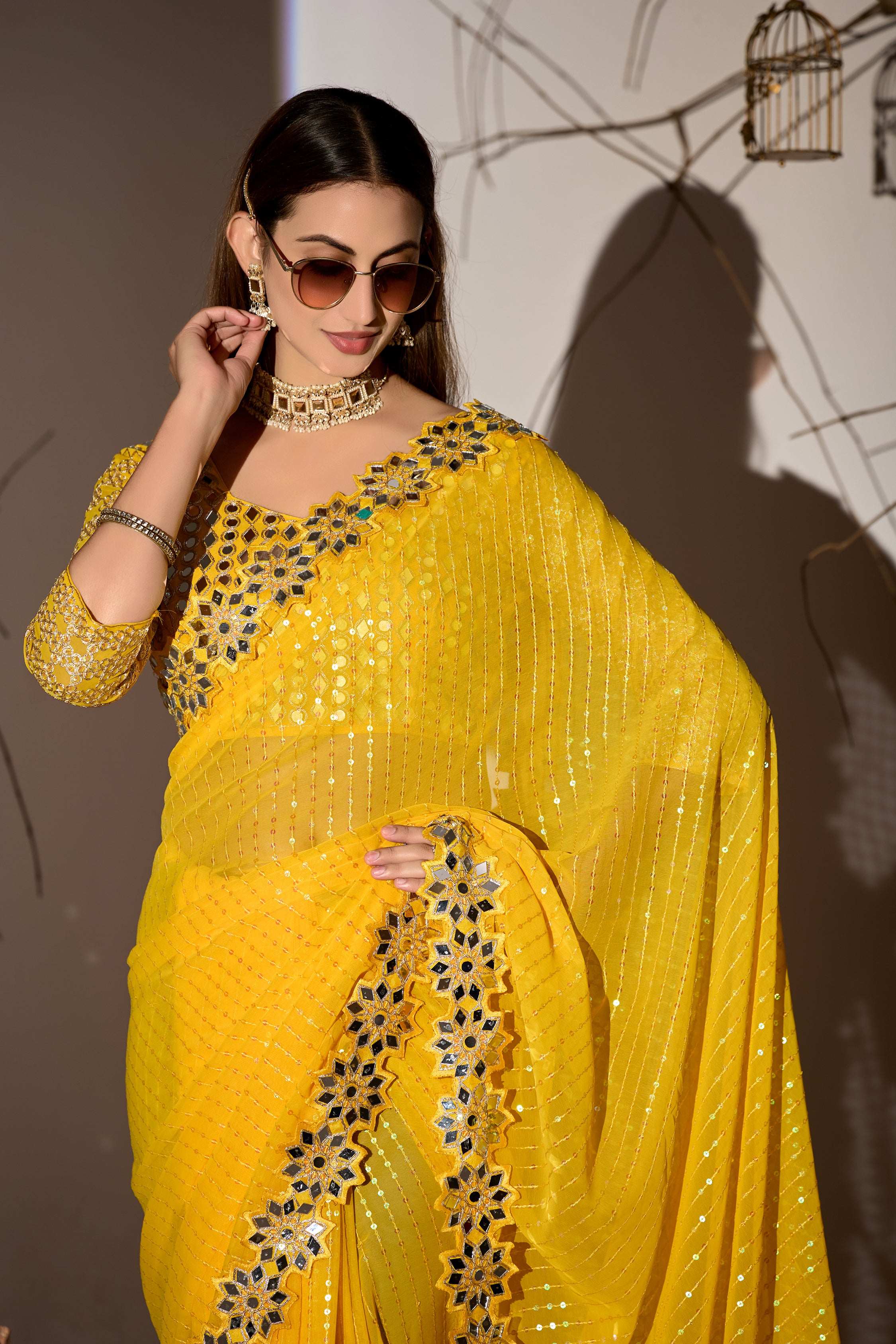 Radiant Tangerine Yellow Georgette Saree with Mirror-Work Border