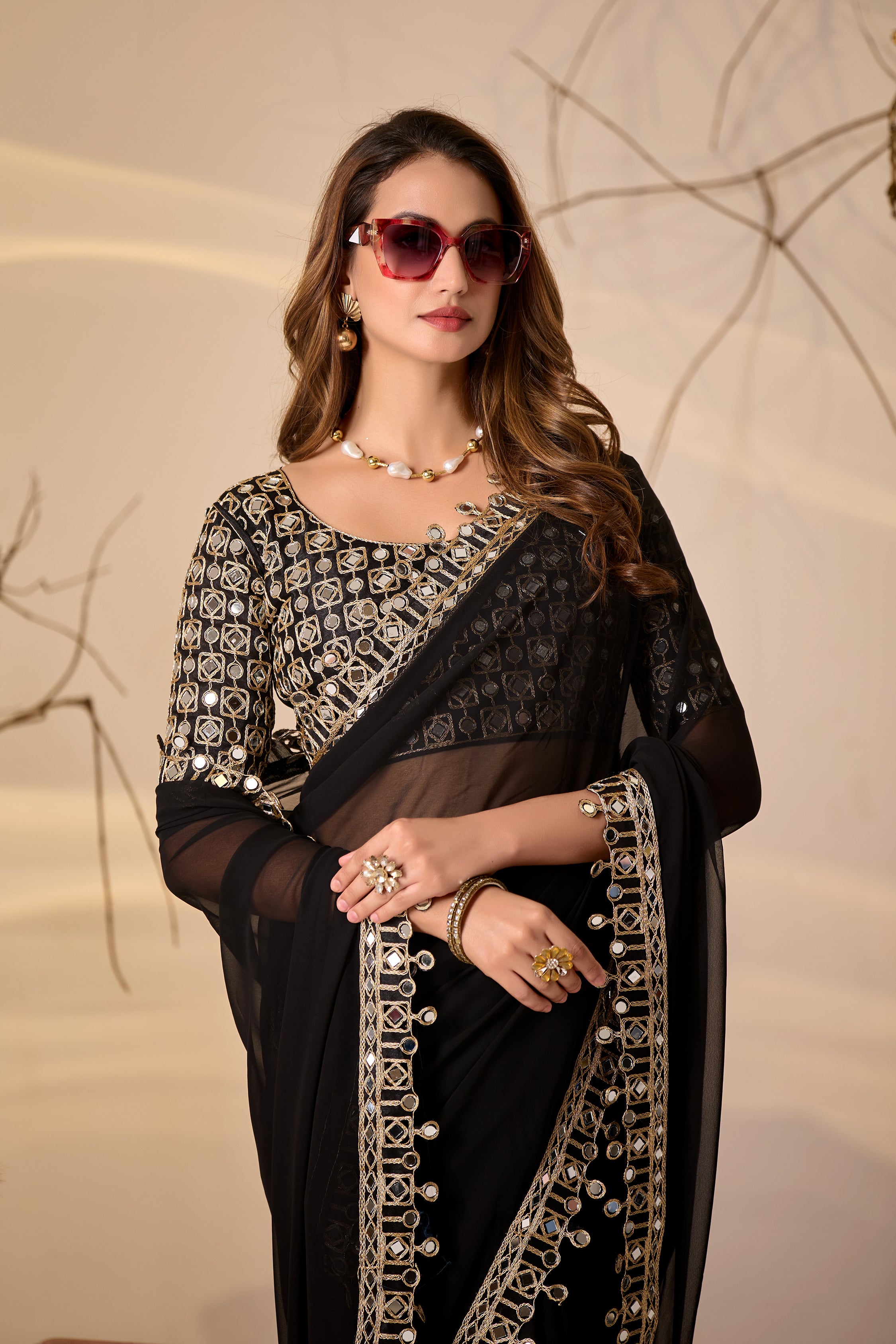 Designer Black Georgette Saree with Mirror Embellished Border
