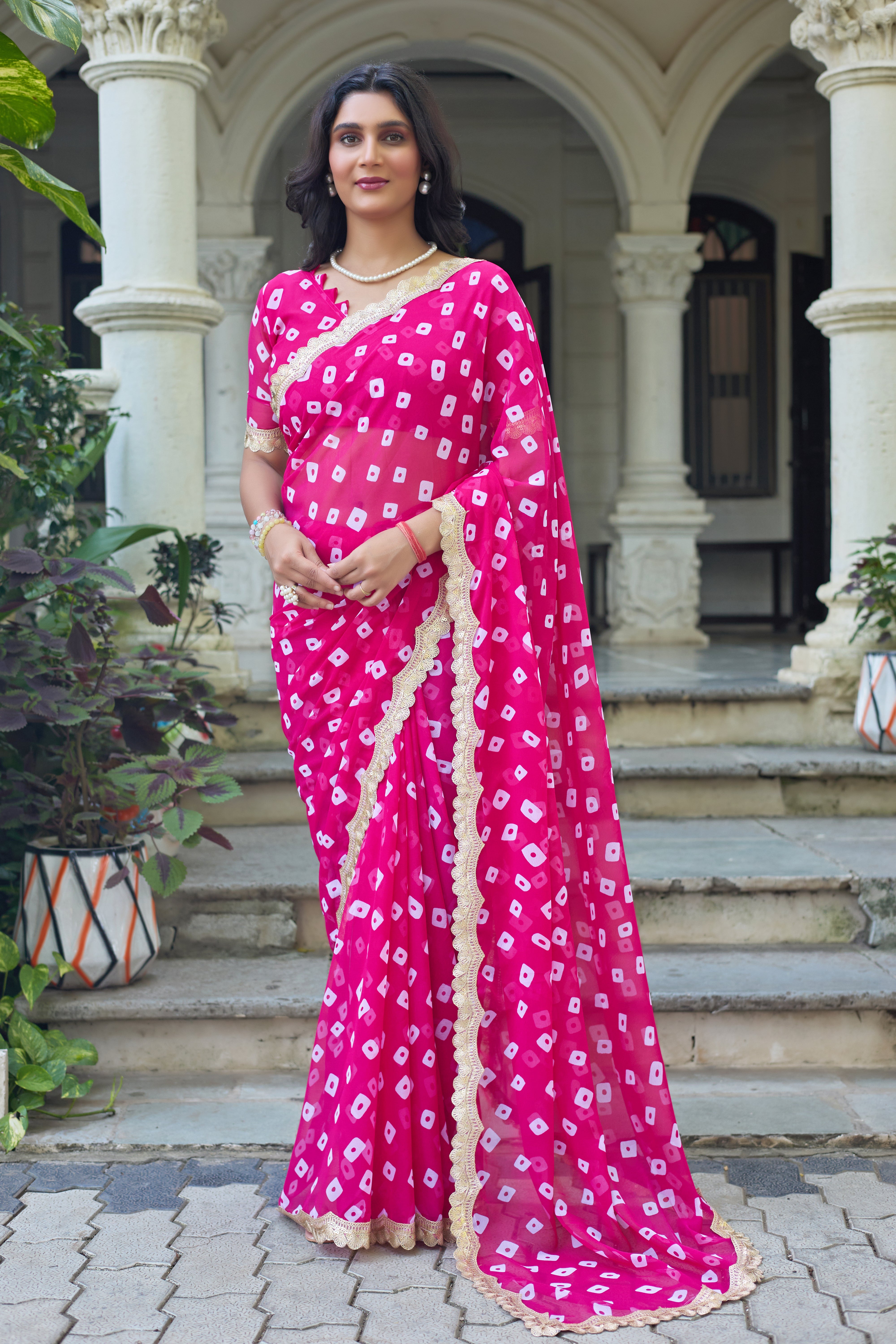 Fuchsia Bandhani Georgette Saree with Golden Lace Border