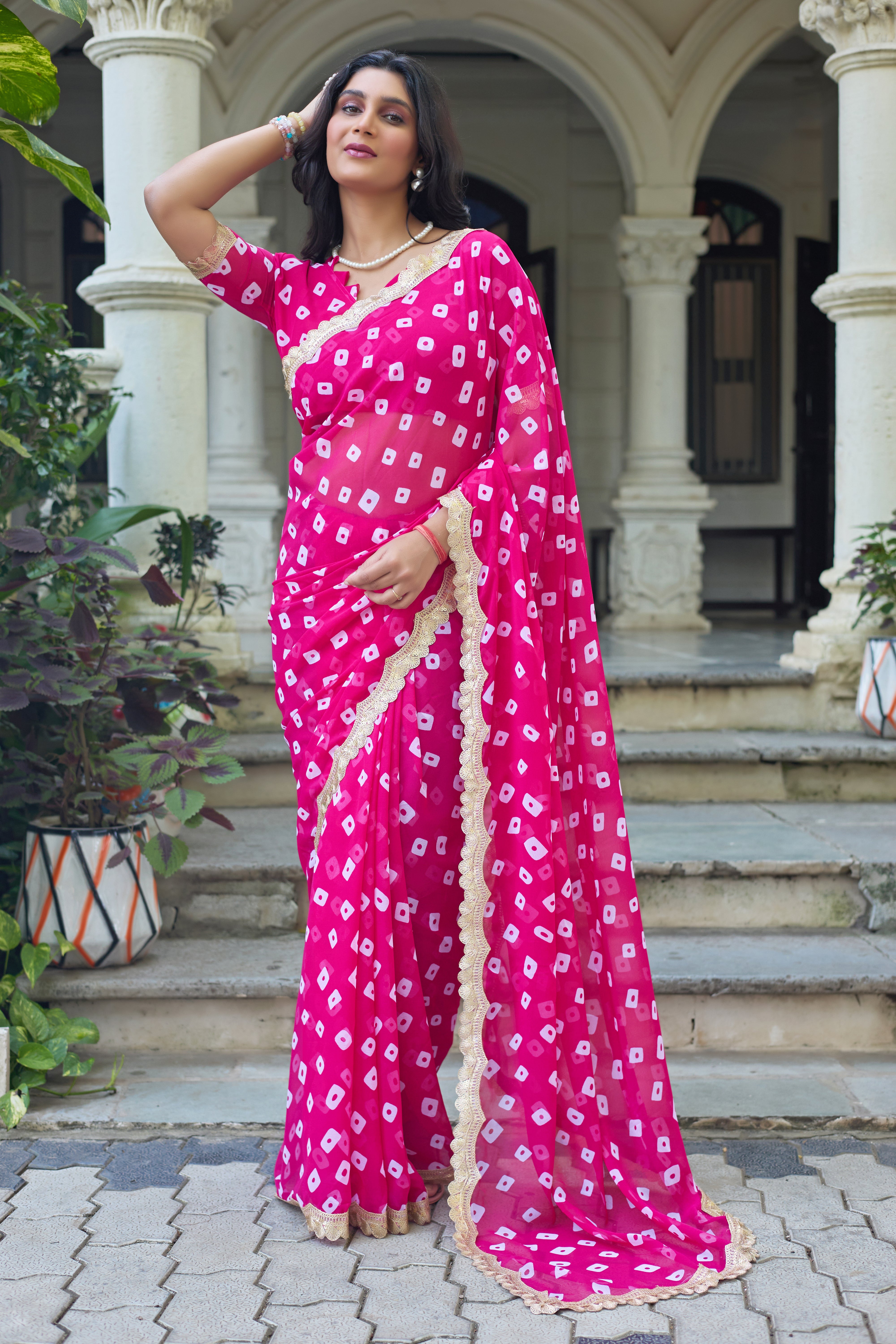Fuchsia Bandhani Georgette Saree with Golden Lace Border