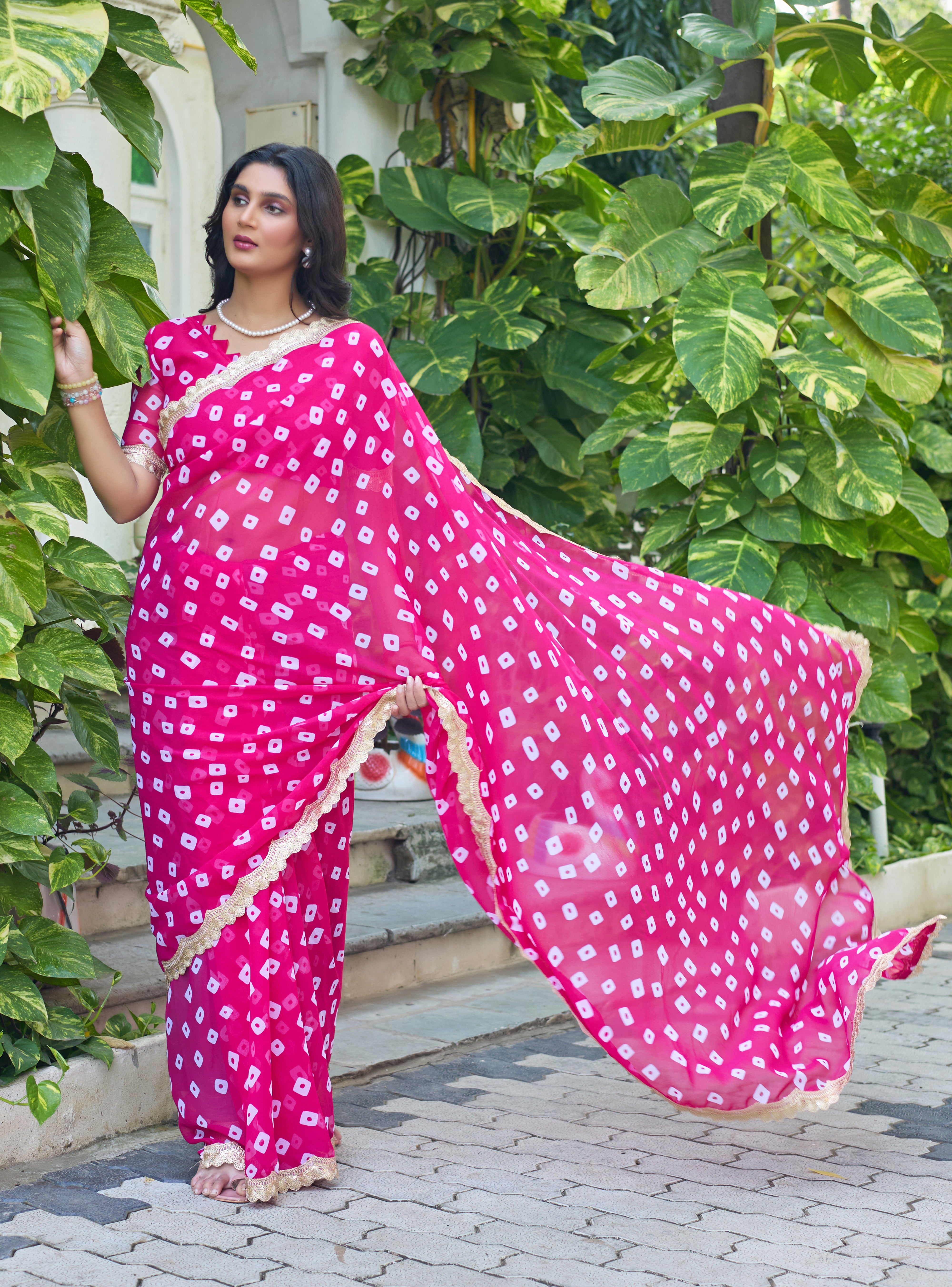 Fuchsia Bandhani Georgette Saree with Golden Lace Border