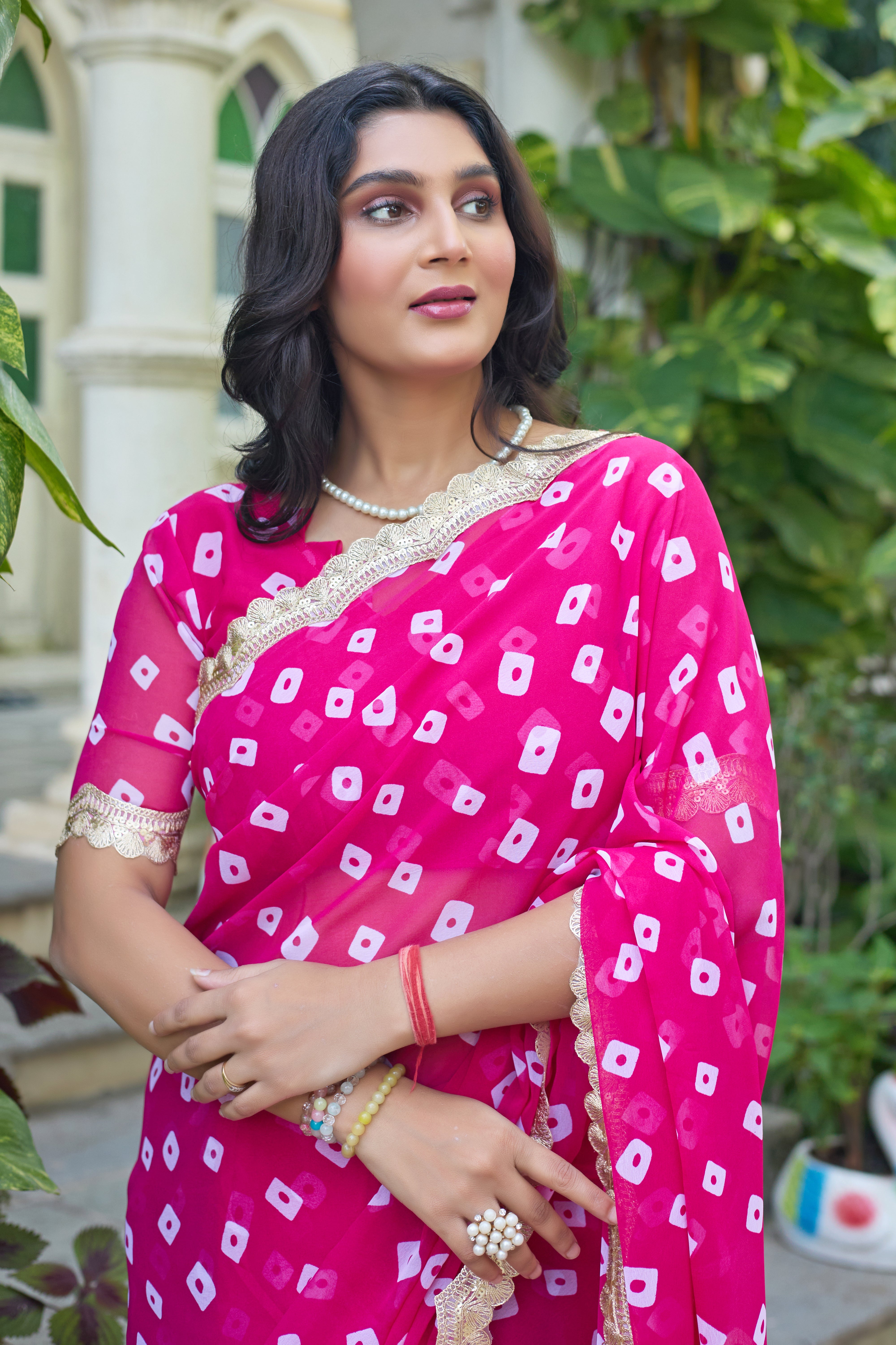 Fuchsia Bandhani Georgette Saree with Golden Lace Border