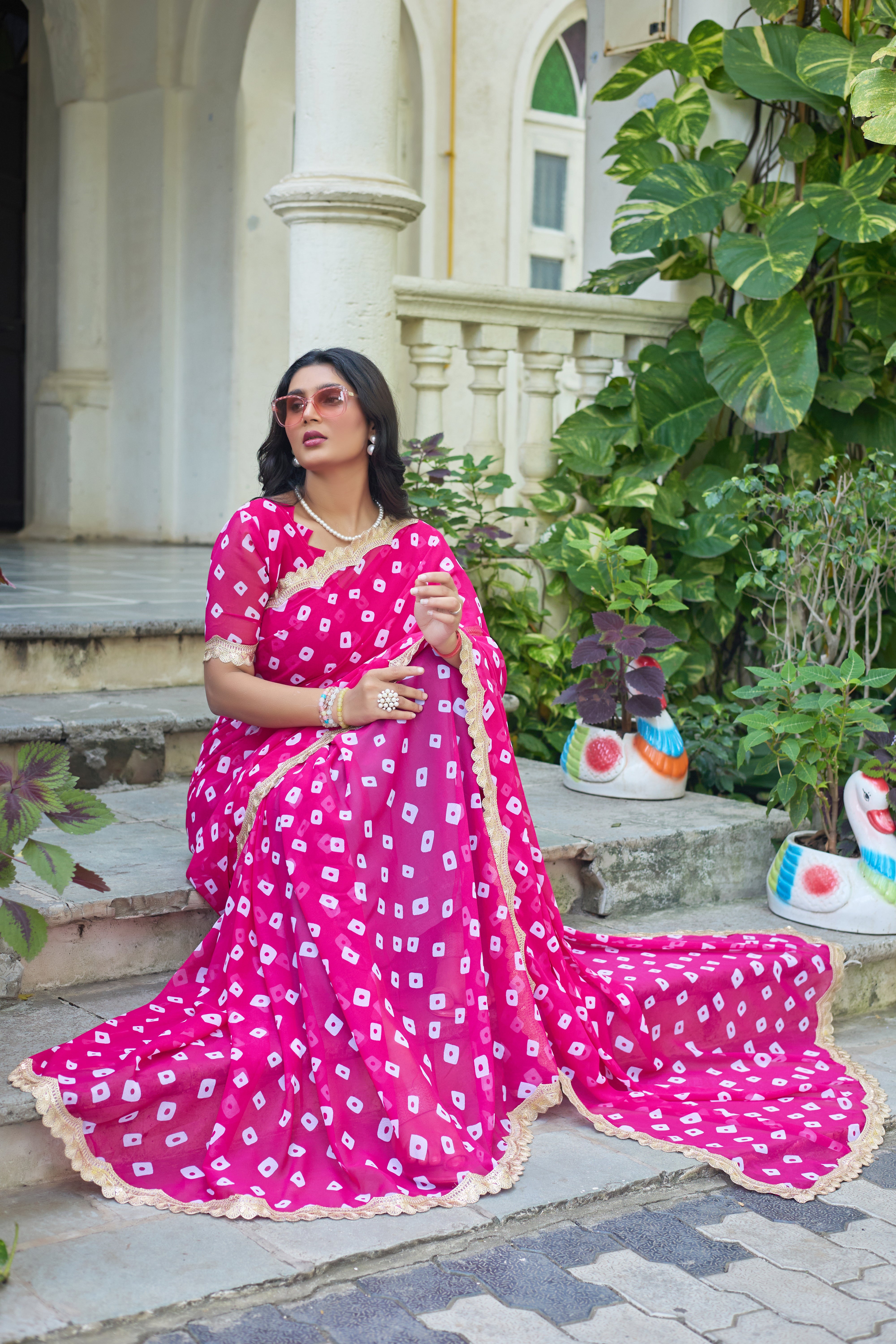 Fuchsia Bandhani Georgette Saree with Golden Lace Border