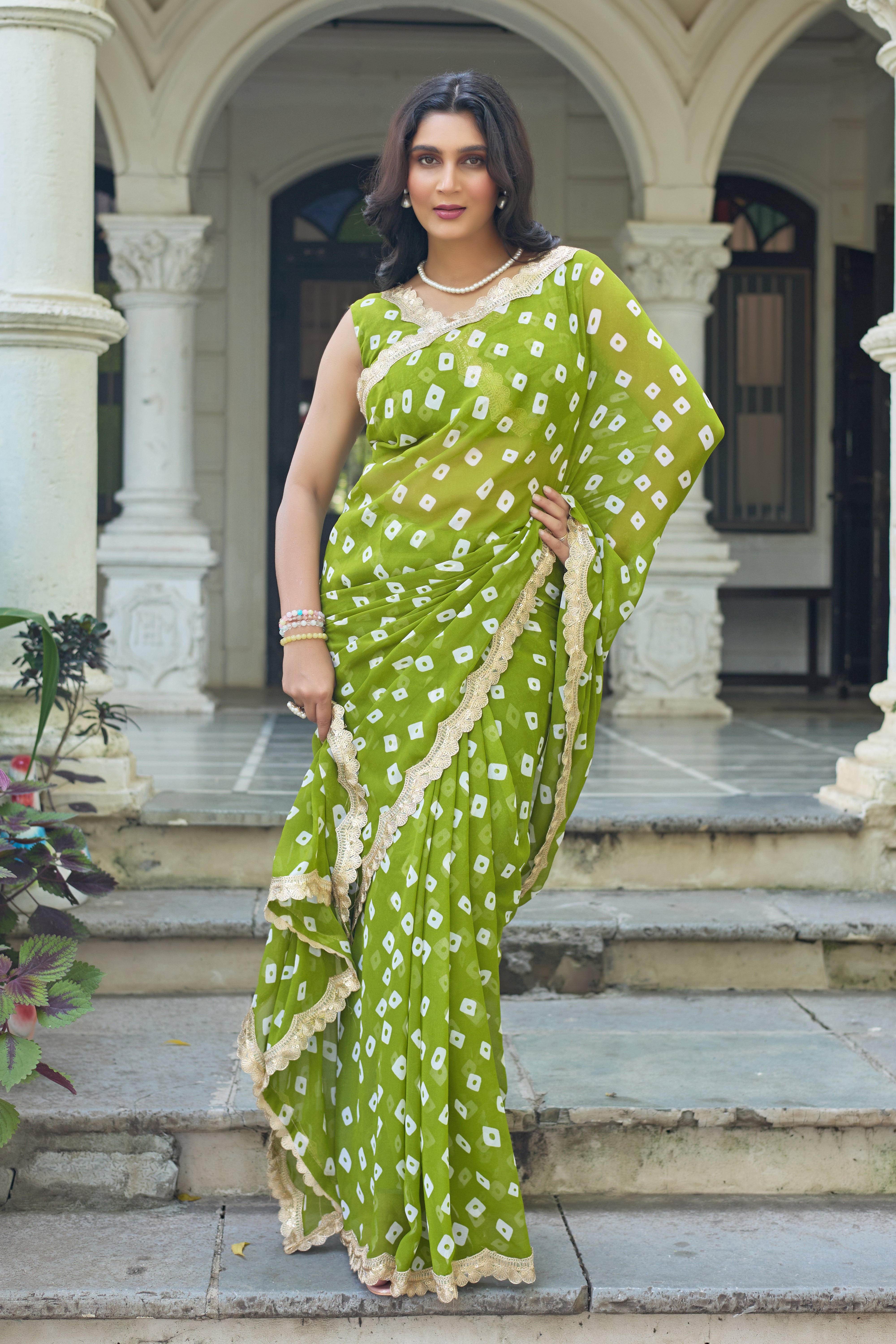 Fuchsia Bandhani Georgette Saree with Golden Lace Border