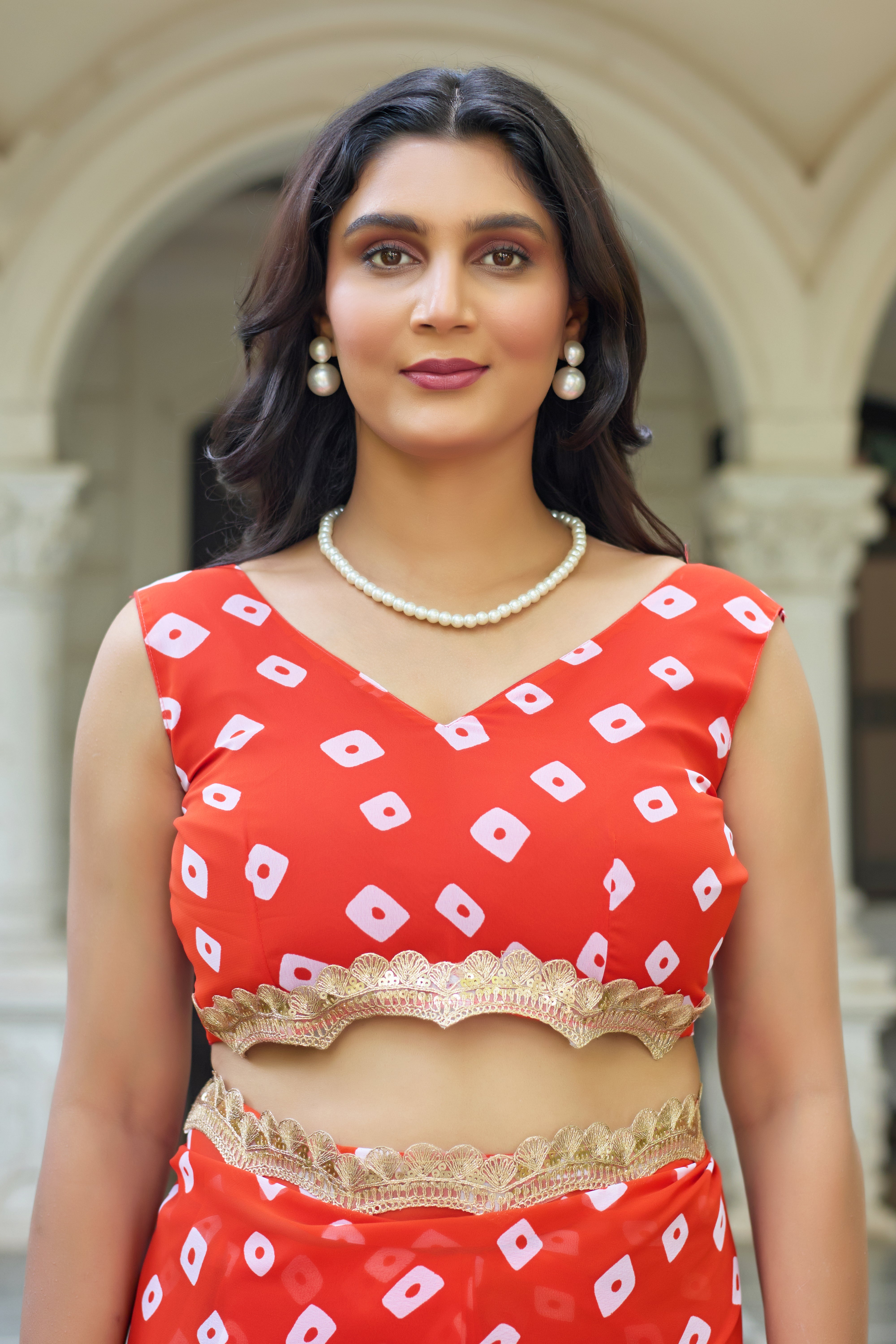 Fuchsia Bandhani Georgette Saree with Golden Lace Border