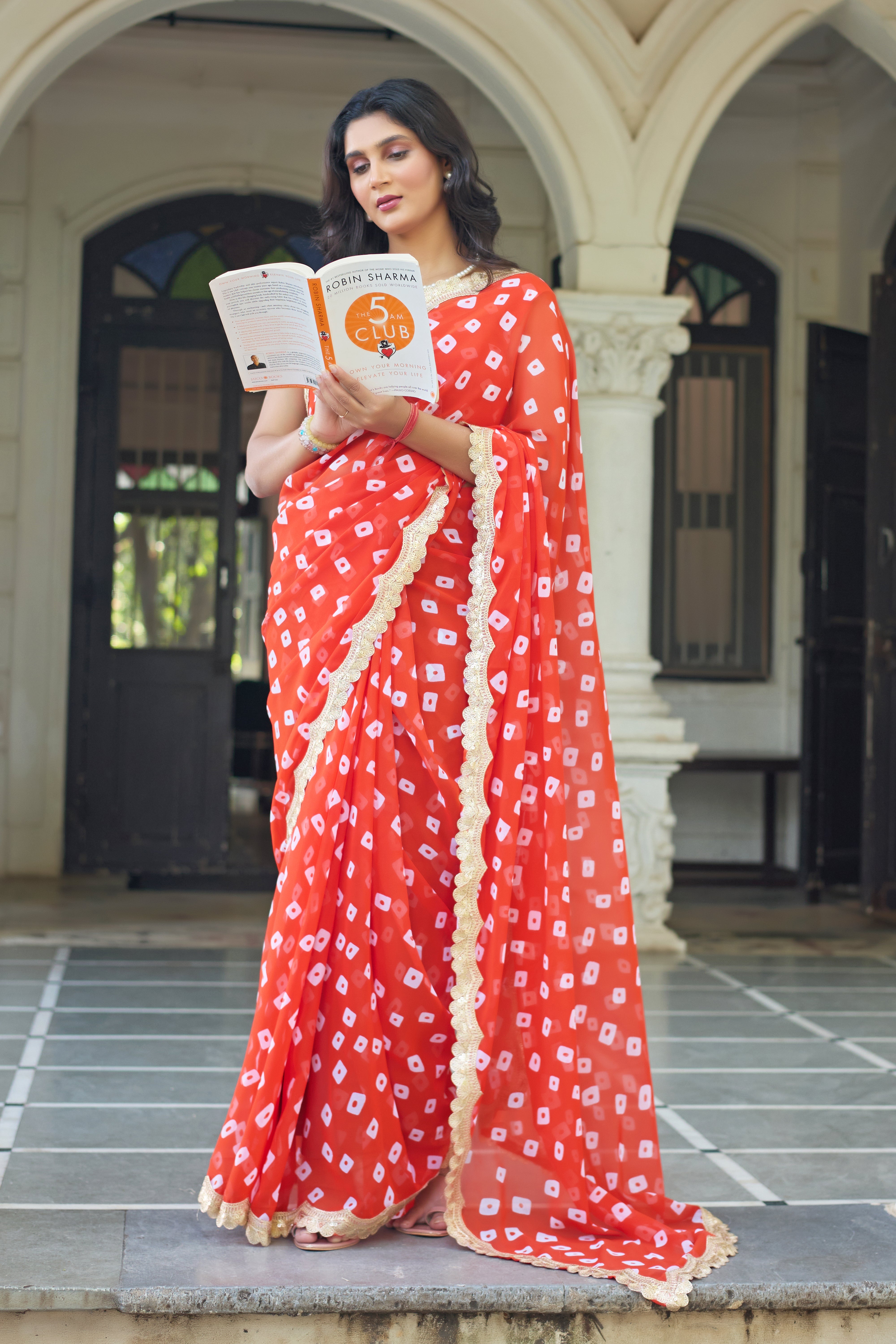 Fuchsia Bandhani Georgette Saree with Golden Lace Border