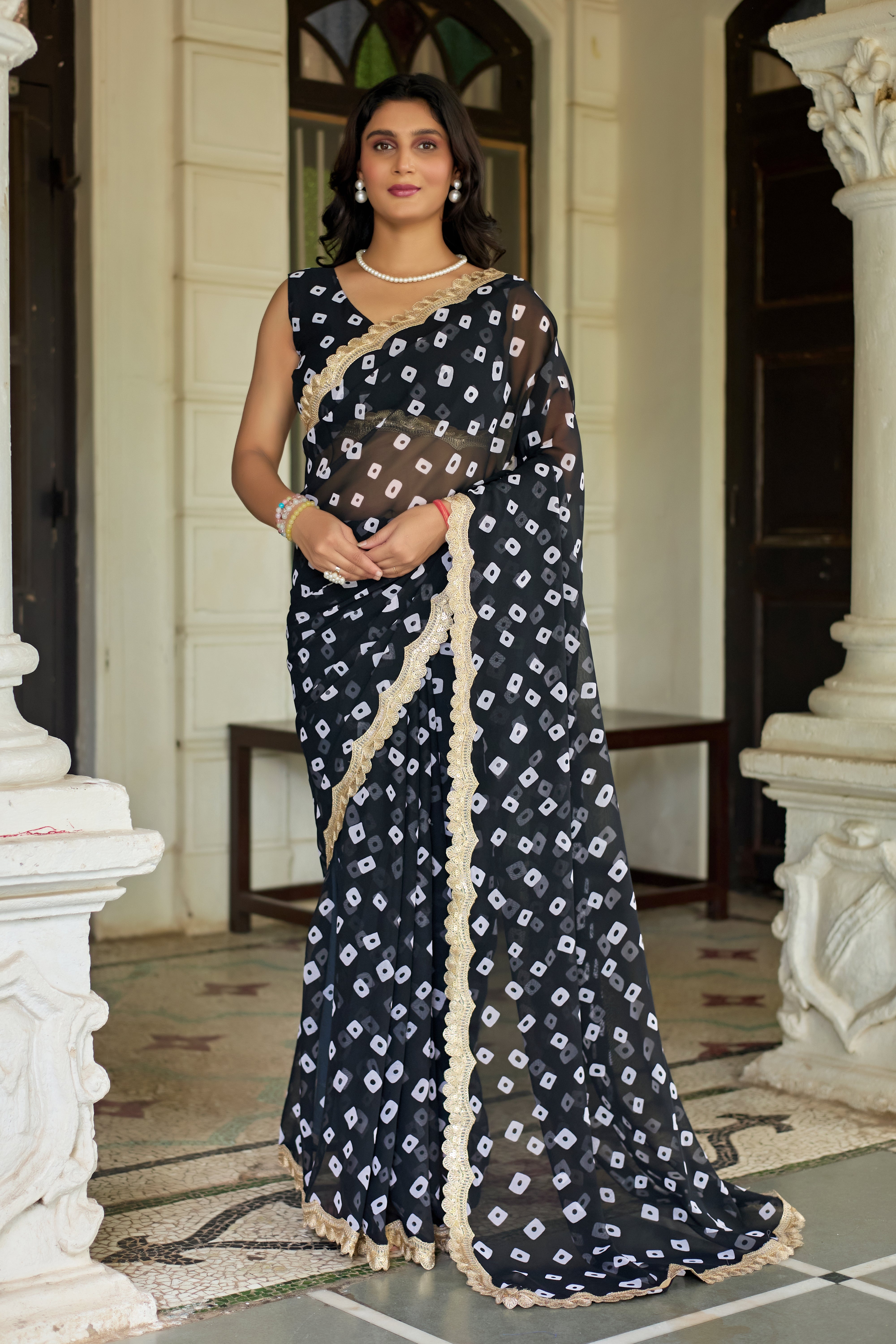 Fuchsia Bandhani Georgette Saree with Golden Lace Border