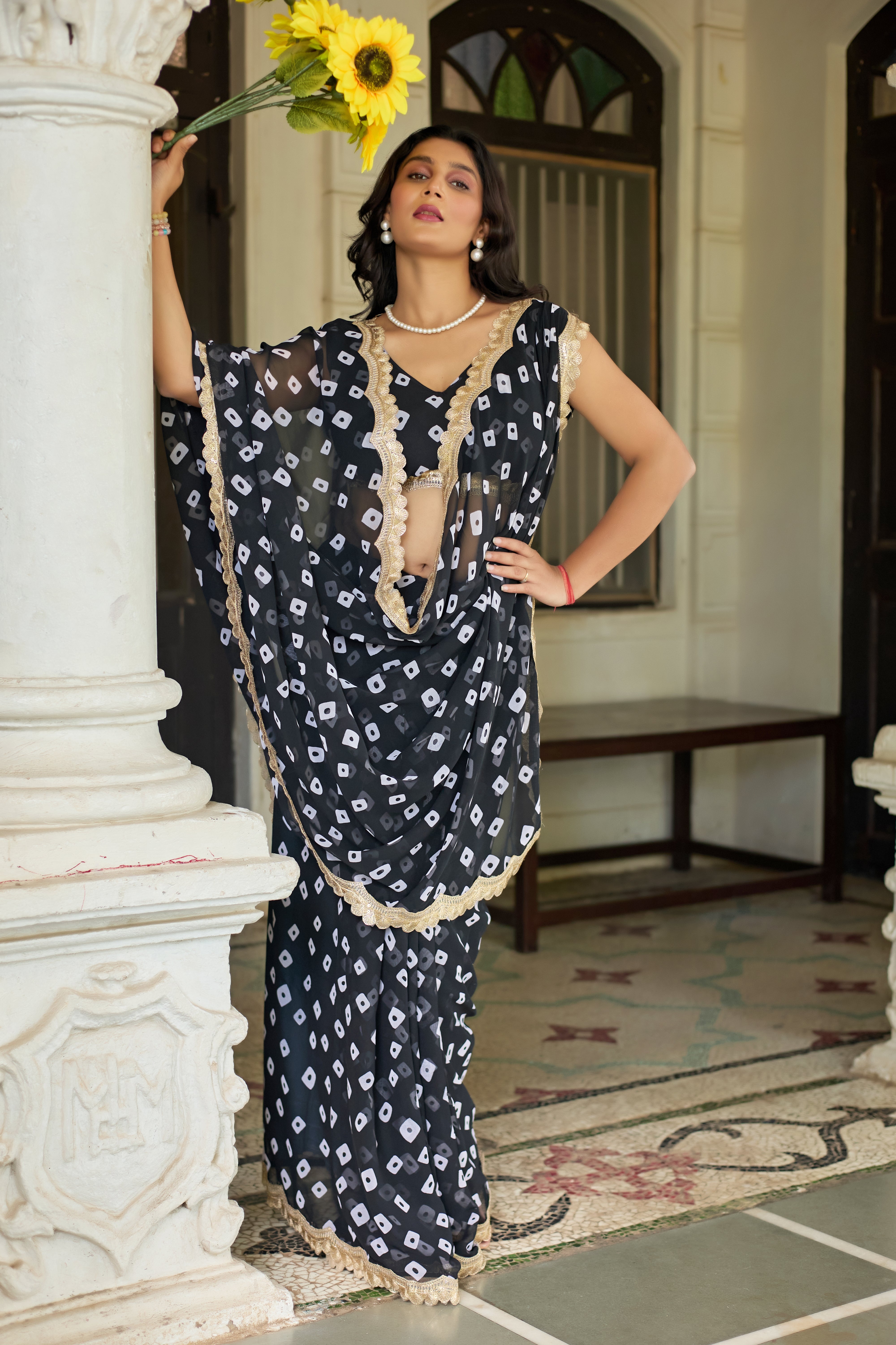 Fuchsia Bandhani Georgette Saree with Golden Lace Border