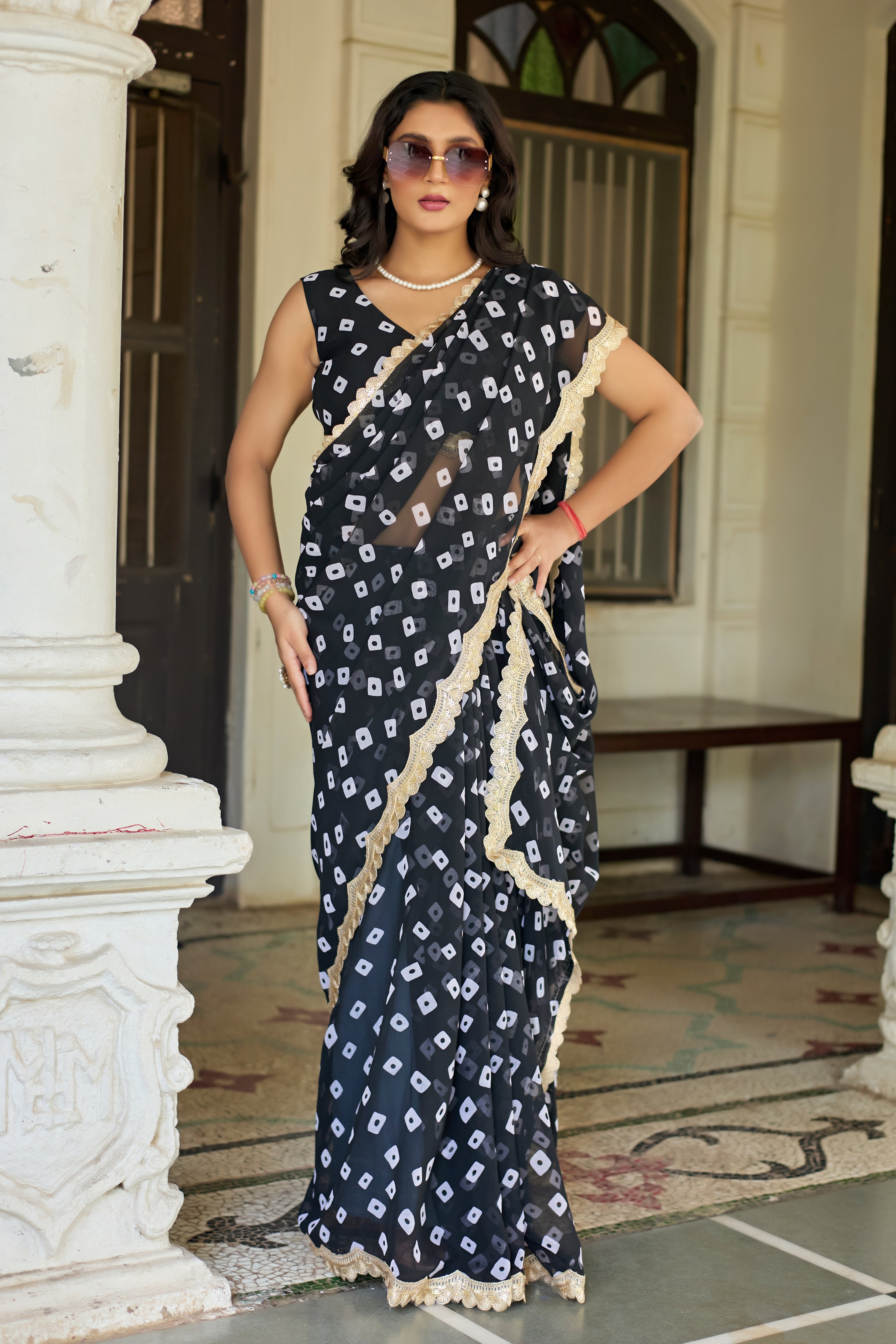 Fuchsia Bandhani Georgette Saree with Golden Lace Border
