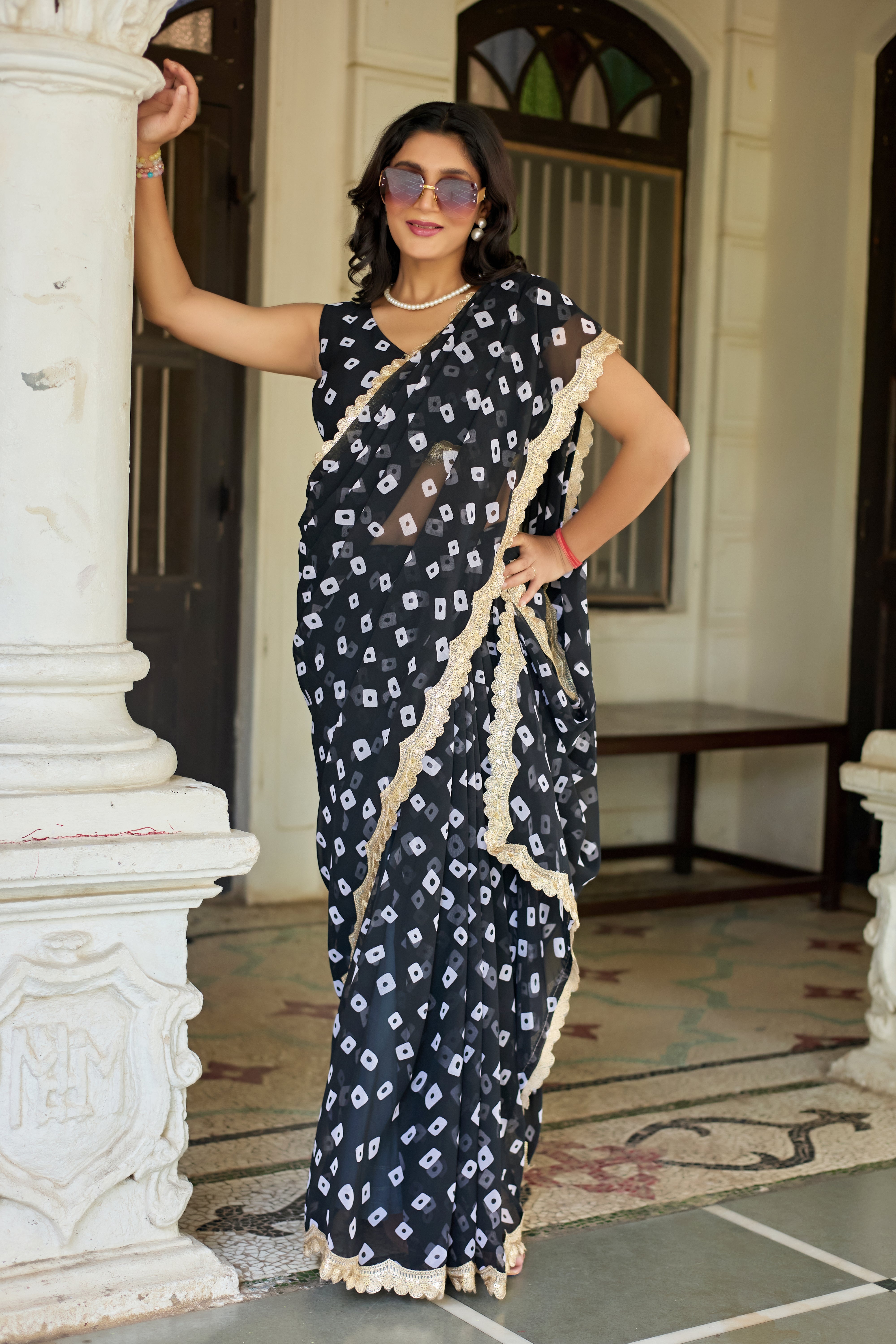 Fuchsia Bandhani Georgette Saree with Golden Lace Border