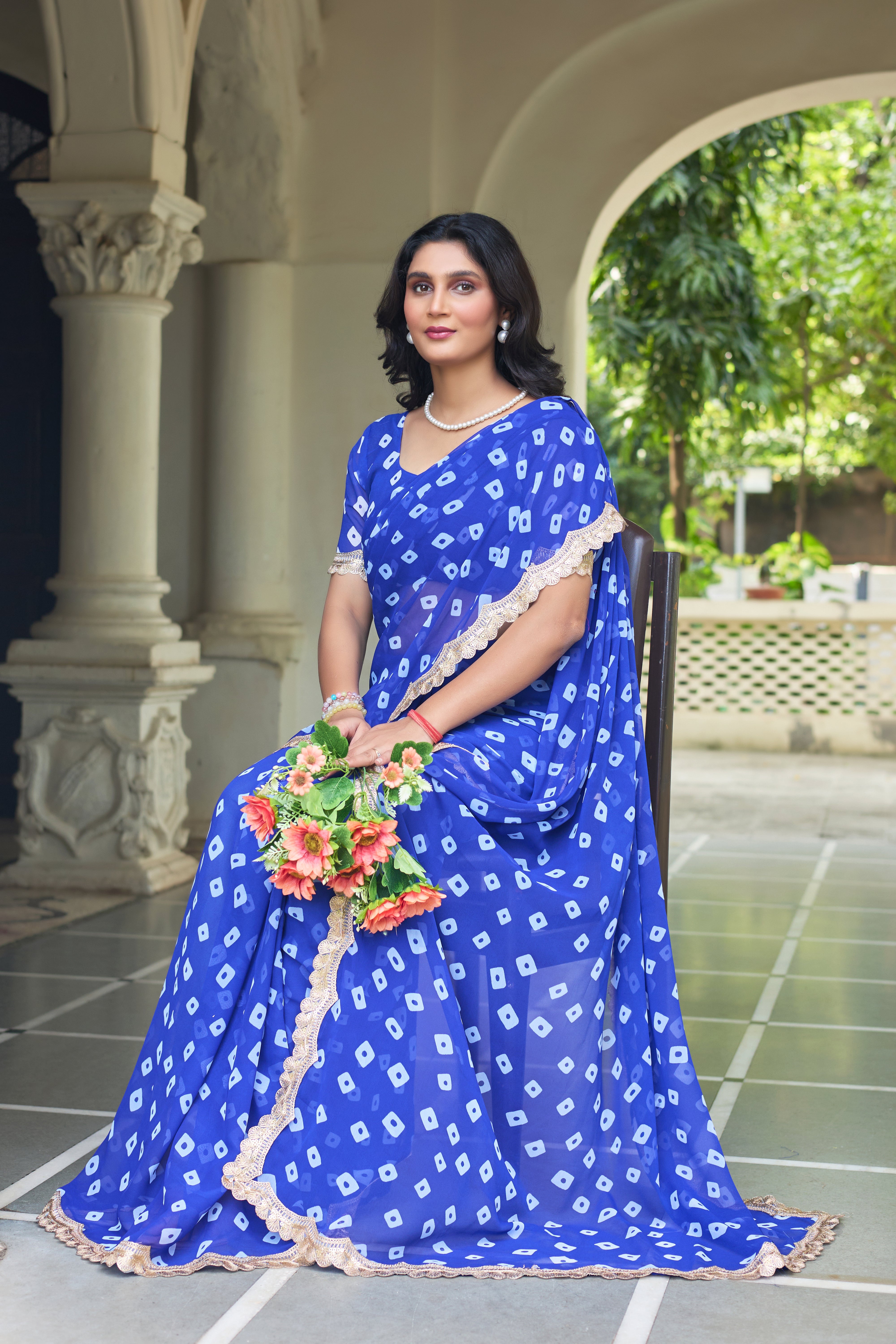 Fuchsia Bandhani Georgette Saree with Golden Lace Border
