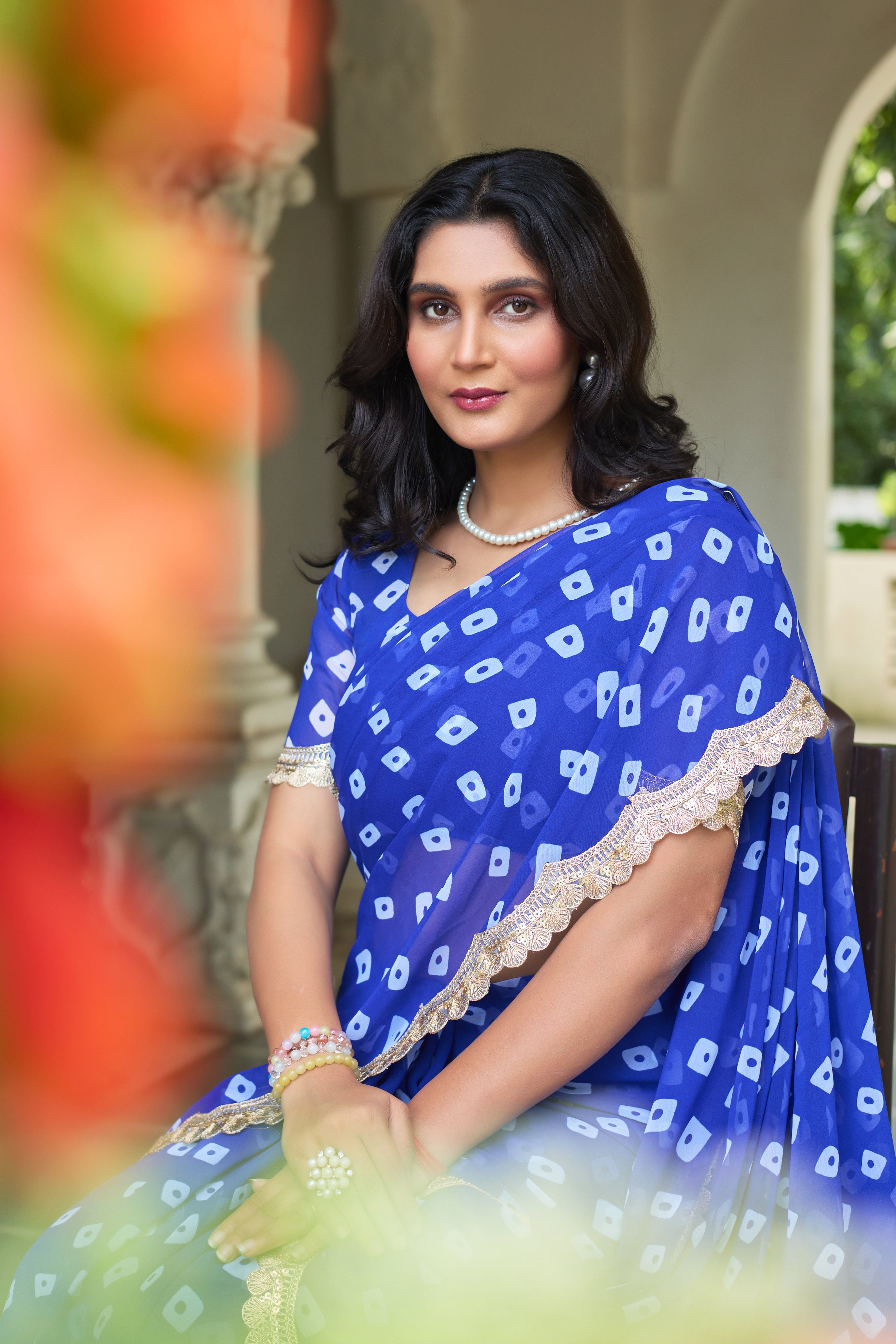 Fuchsia Bandhani Georgette Saree with Golden Lace Border