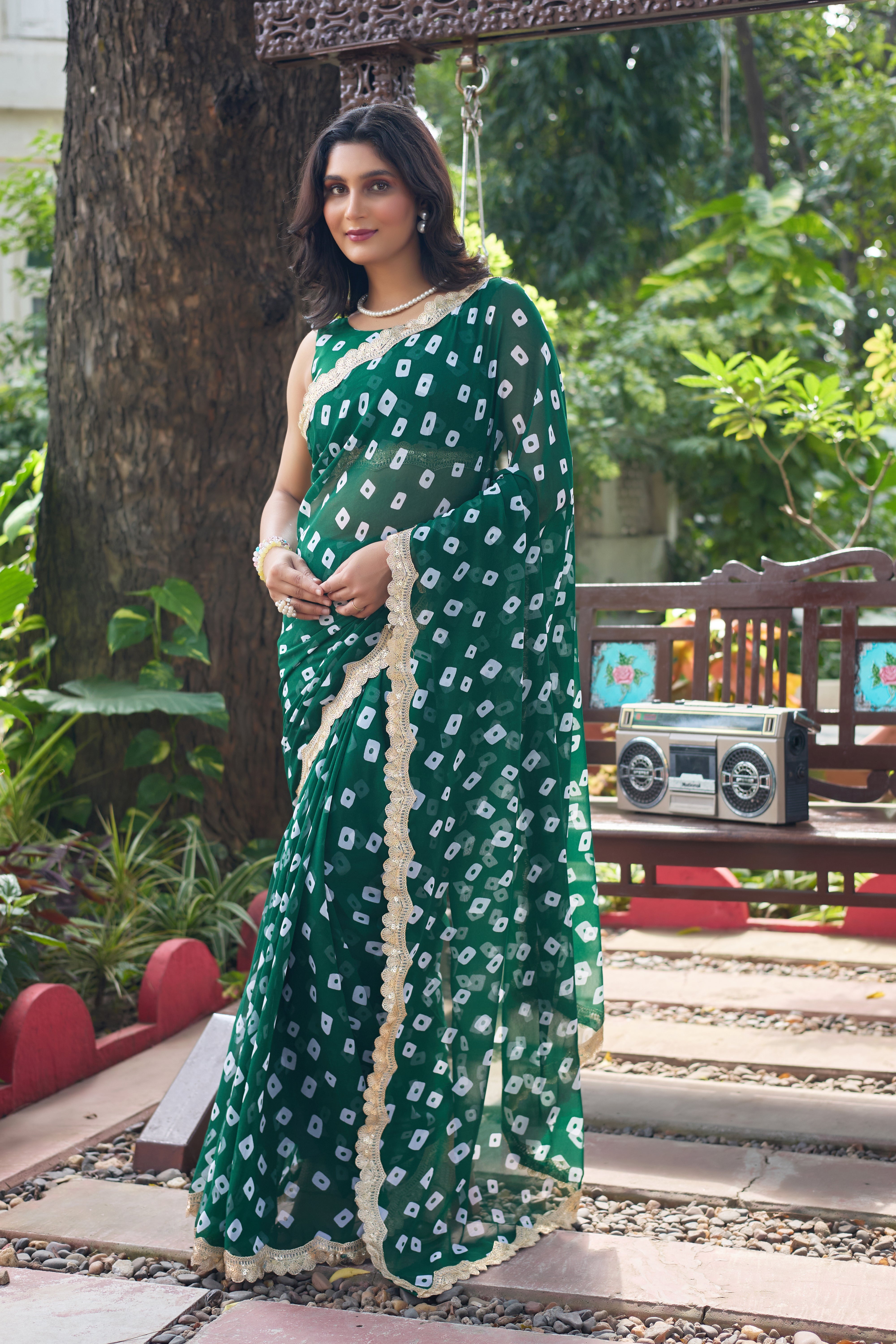 Fuchsia Bandhani Georgette Saree with Golden Lace Border