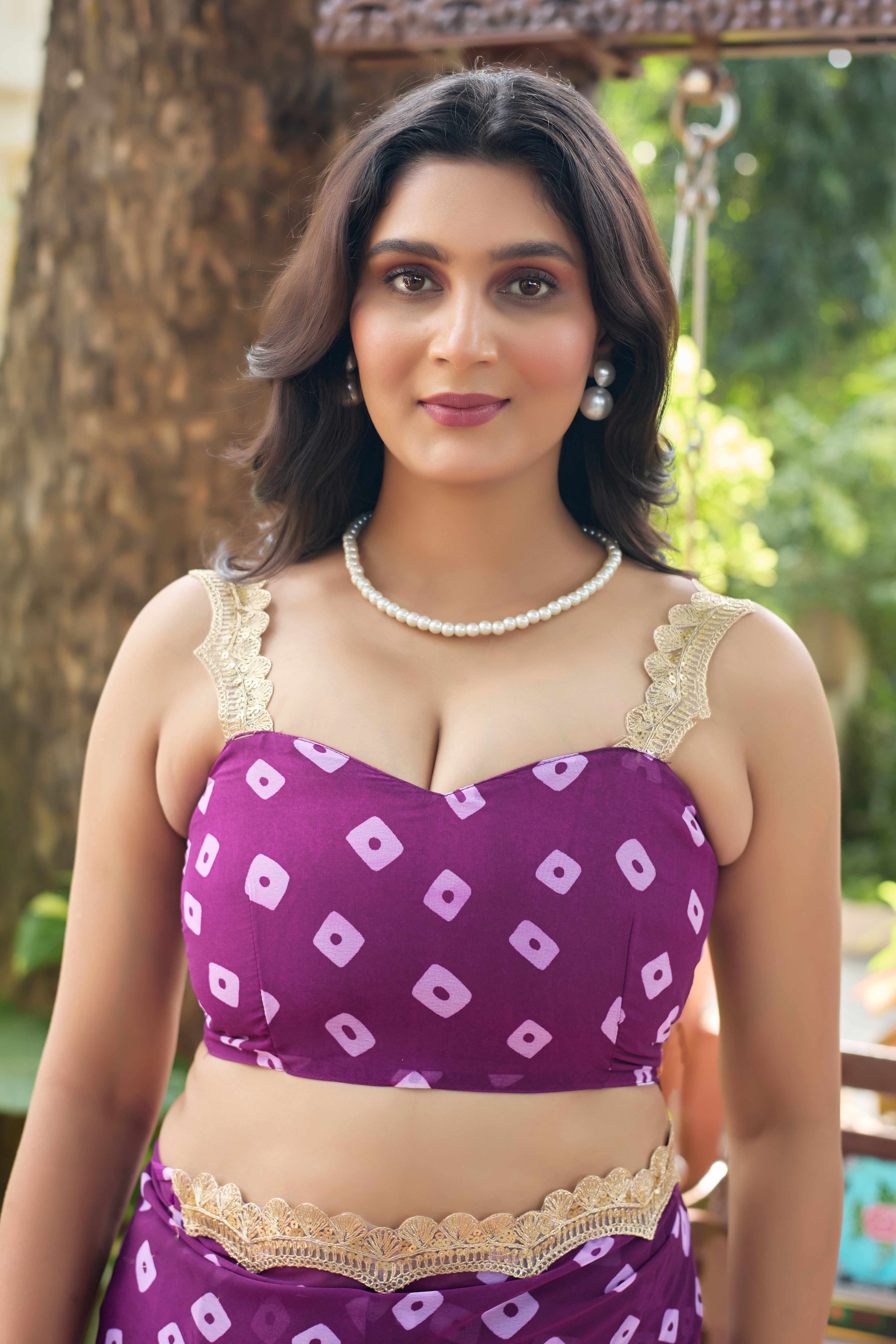 Fuchsia Bandhani Georgette Saree with Golden Lace Border