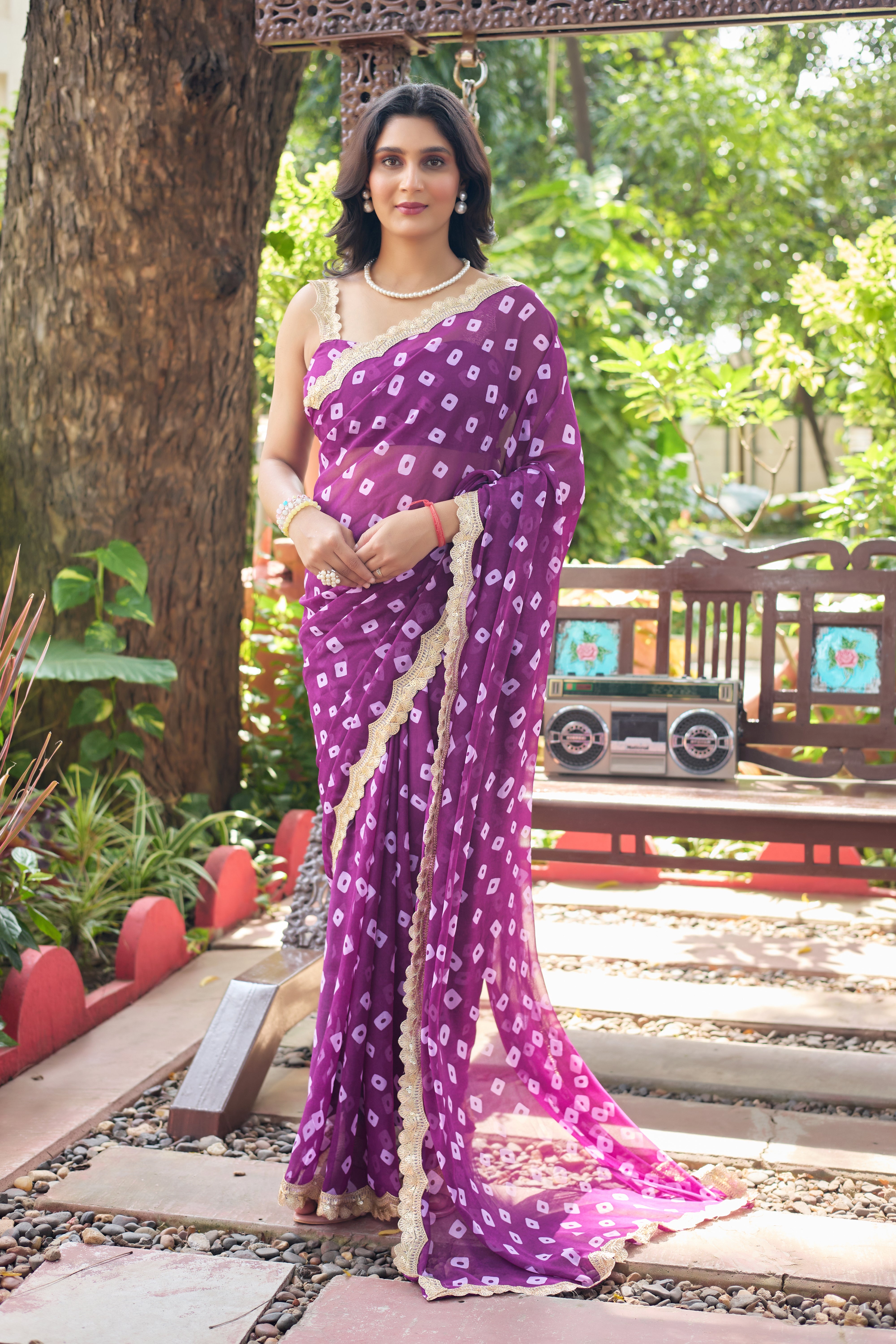 Fuchsia Bandhani Georgette Saree with Golden Lace Border