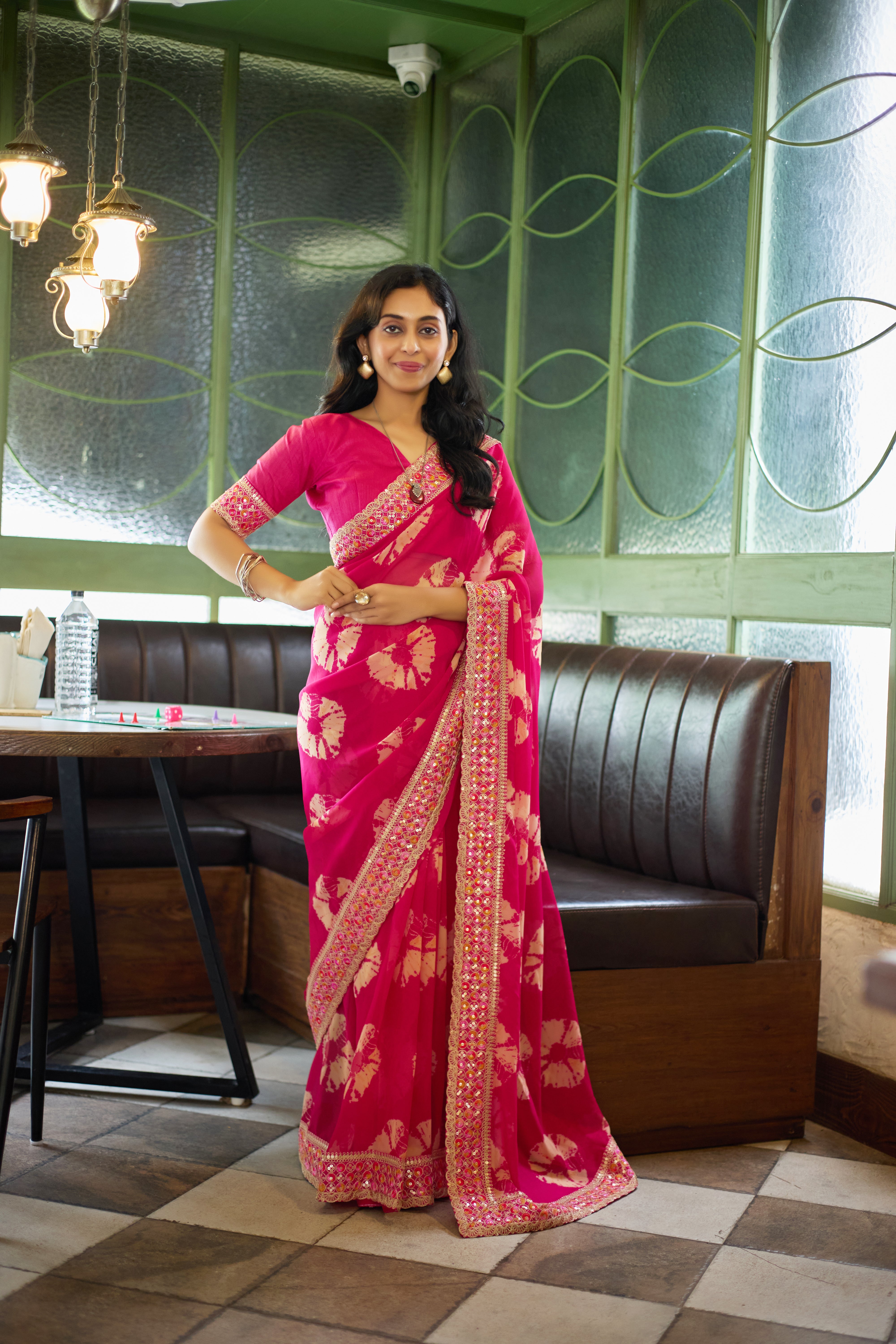 Designer Pink Georgette Saree with Heavy Embellished Border